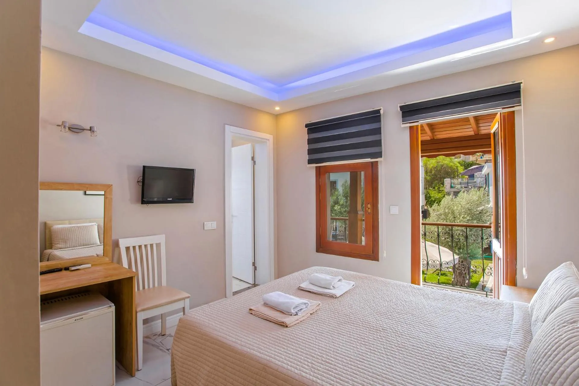 Bed in Nur Suites & Hotels