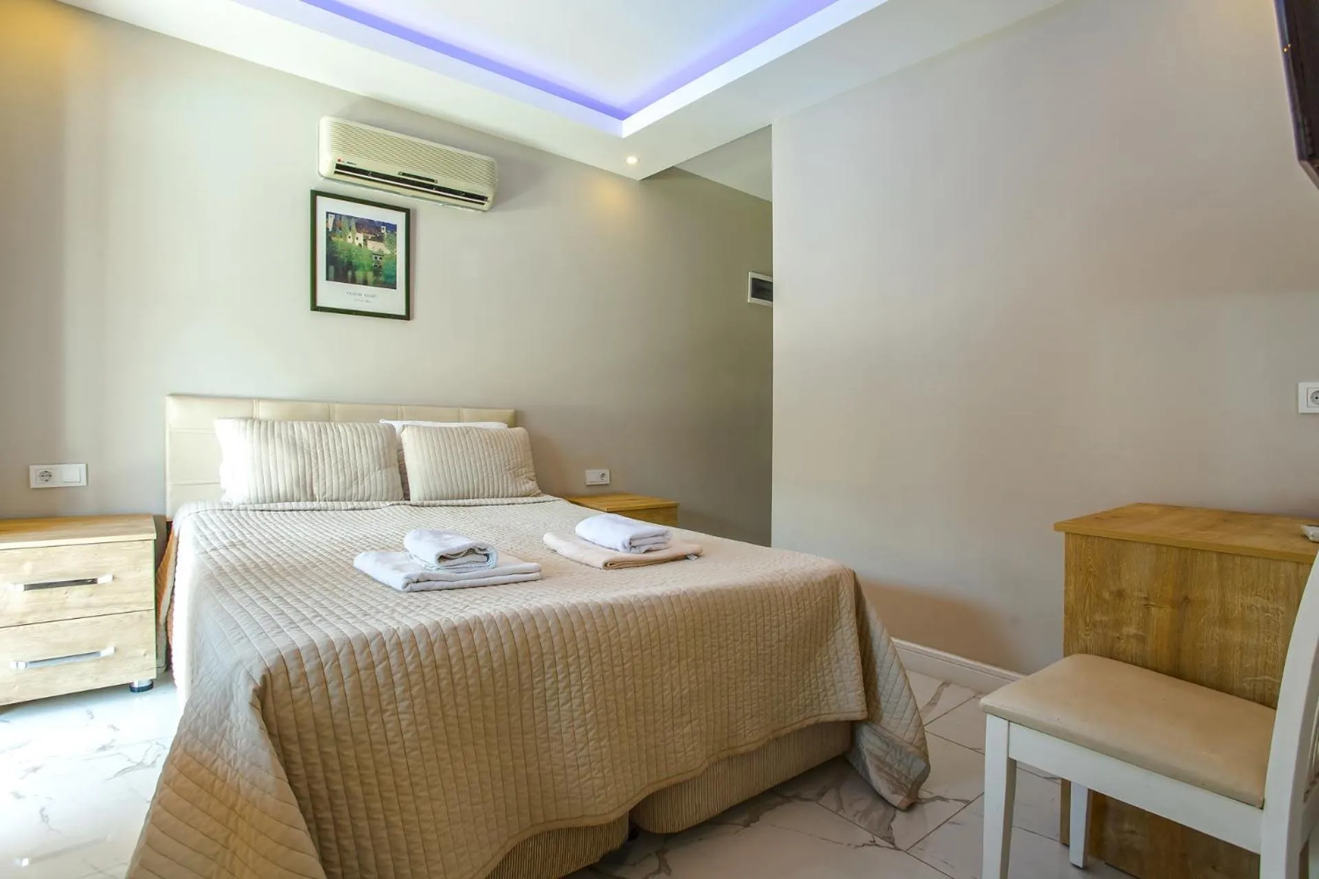 Bed in Nur Suites & Hotels