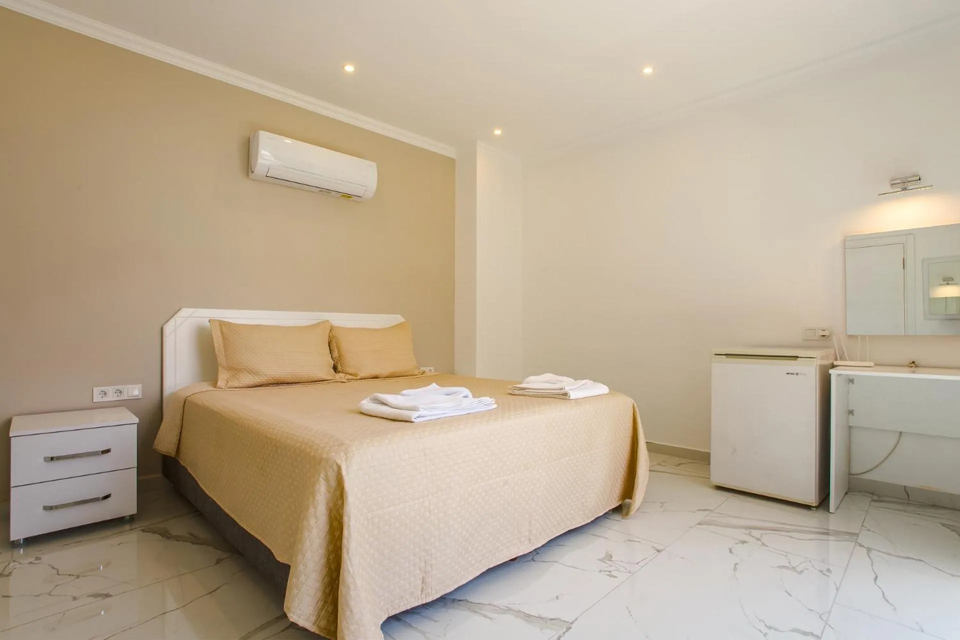 Bed in Nur Suites & Hotels