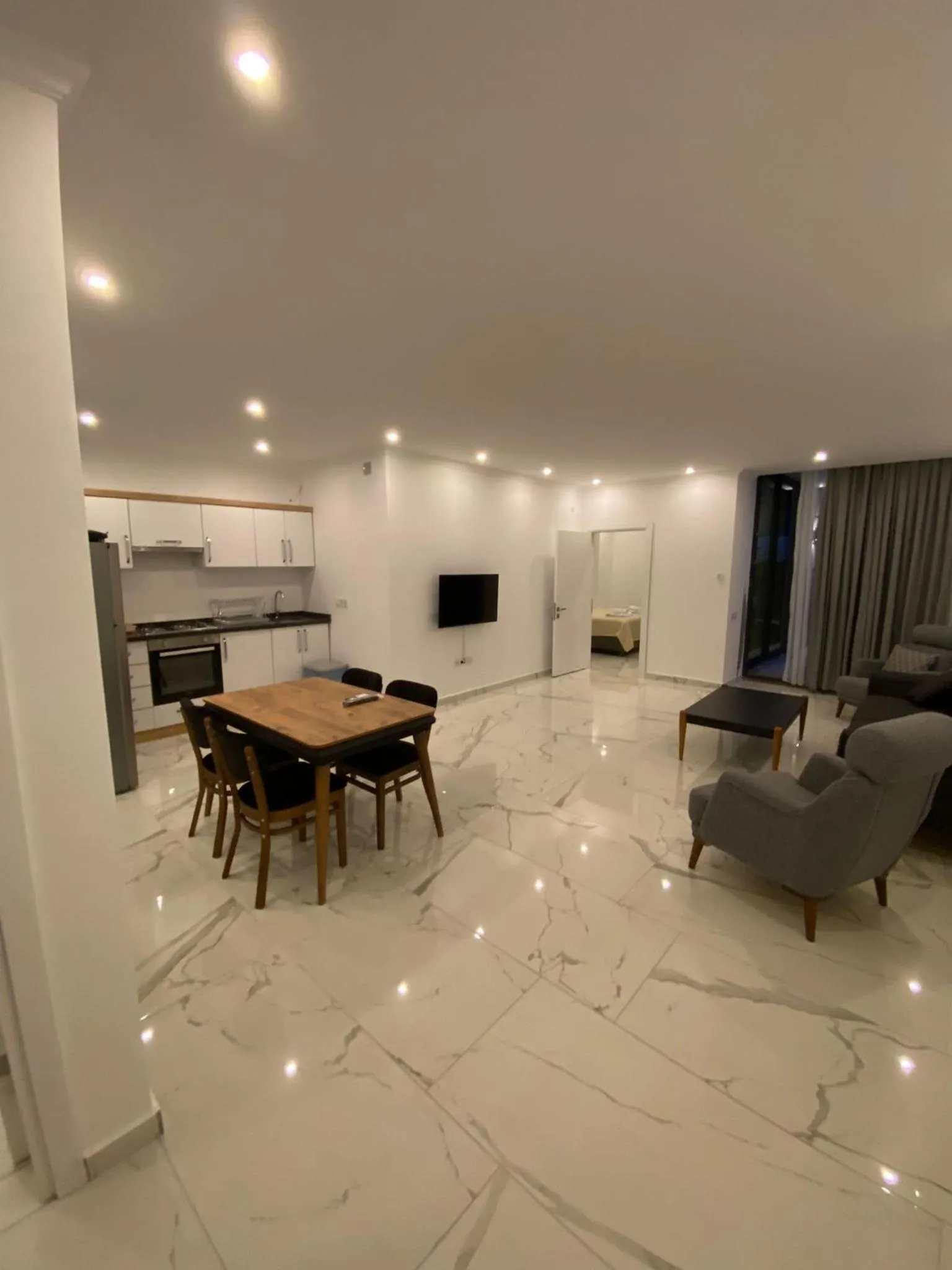 Communal lounge/ TV room in Nur Suites & Hotels