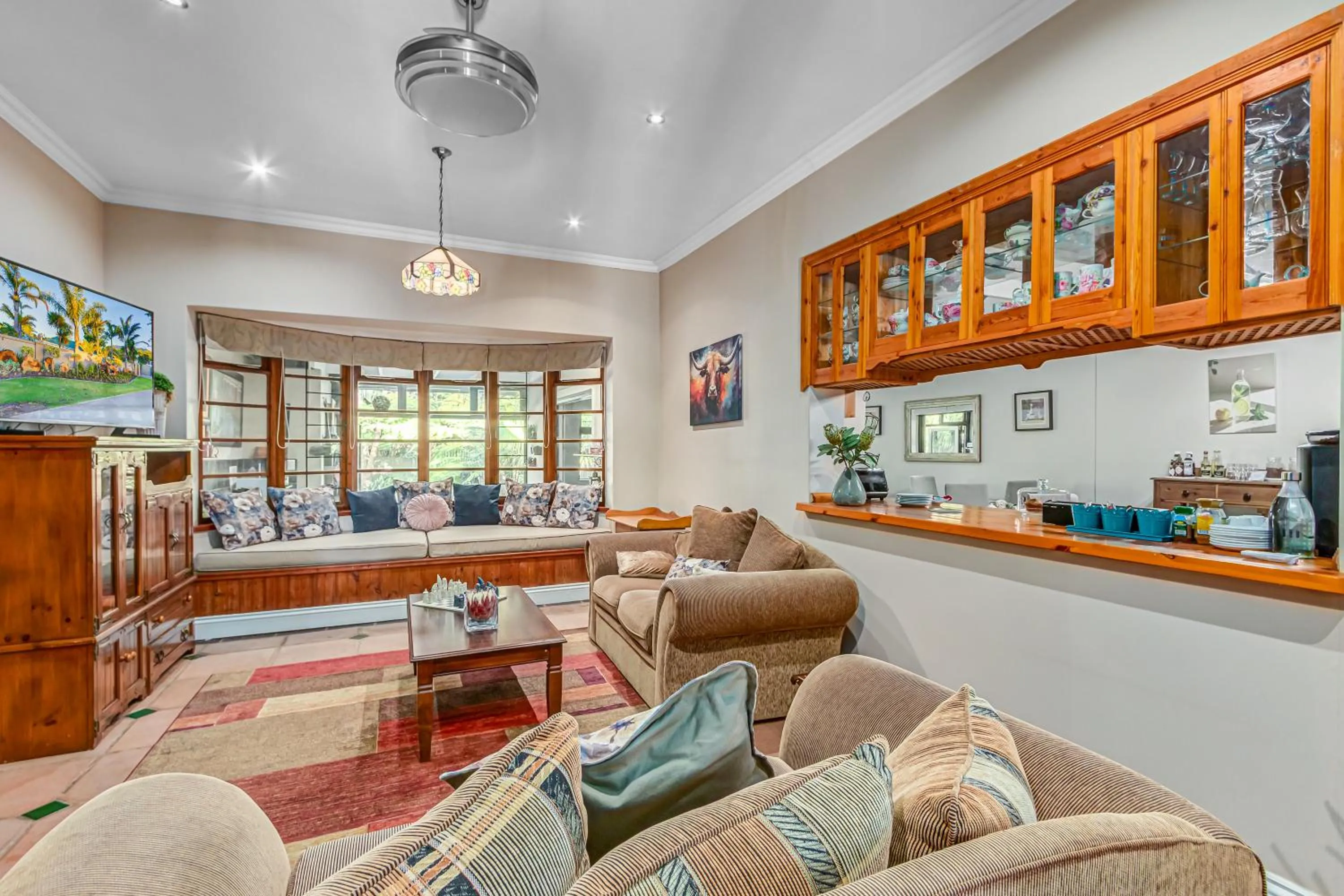 Communal lounge/ TV room in Caledon 23 Guest House