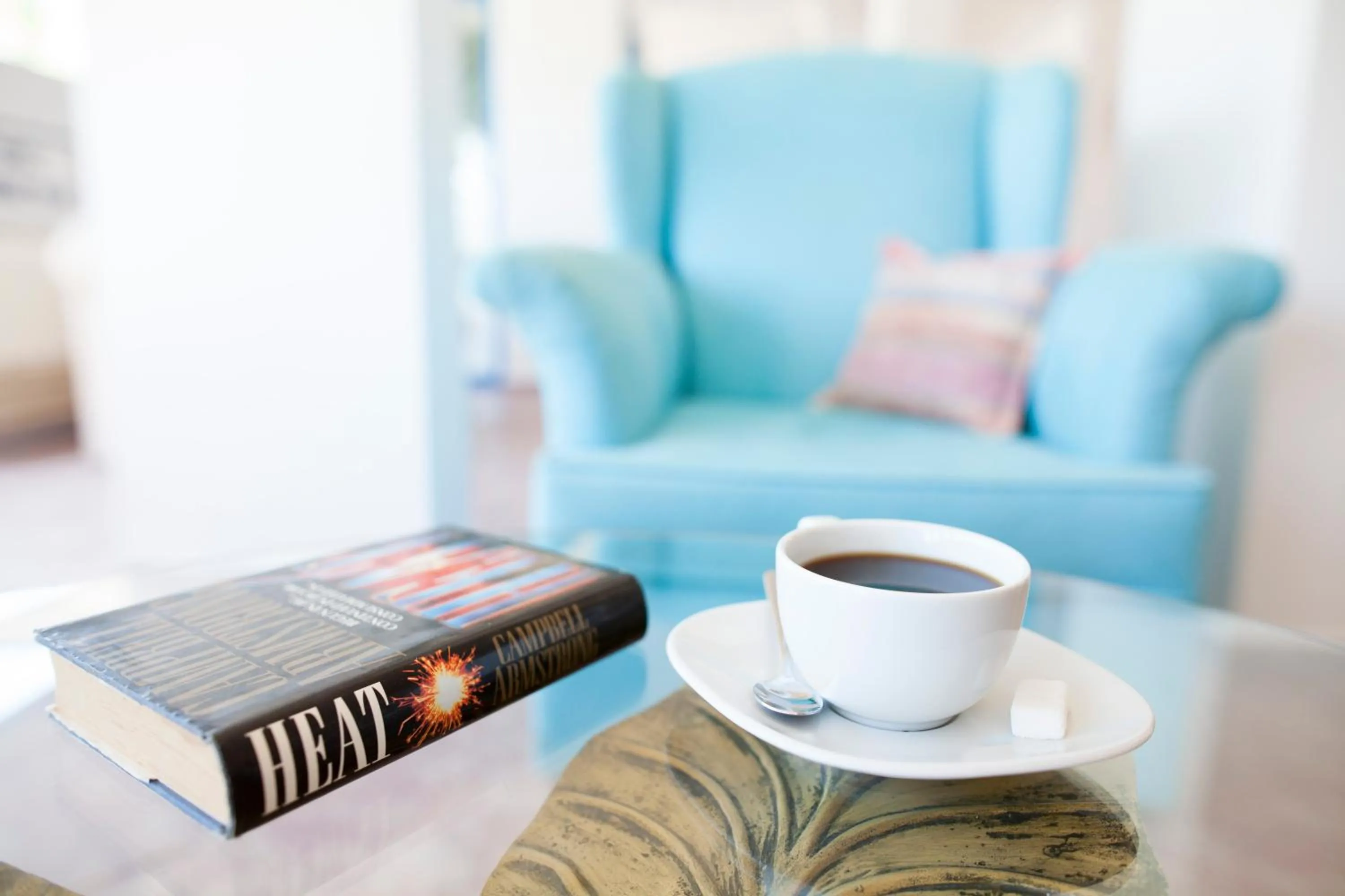 Communal lounge/ TV room in One More Day Hotel