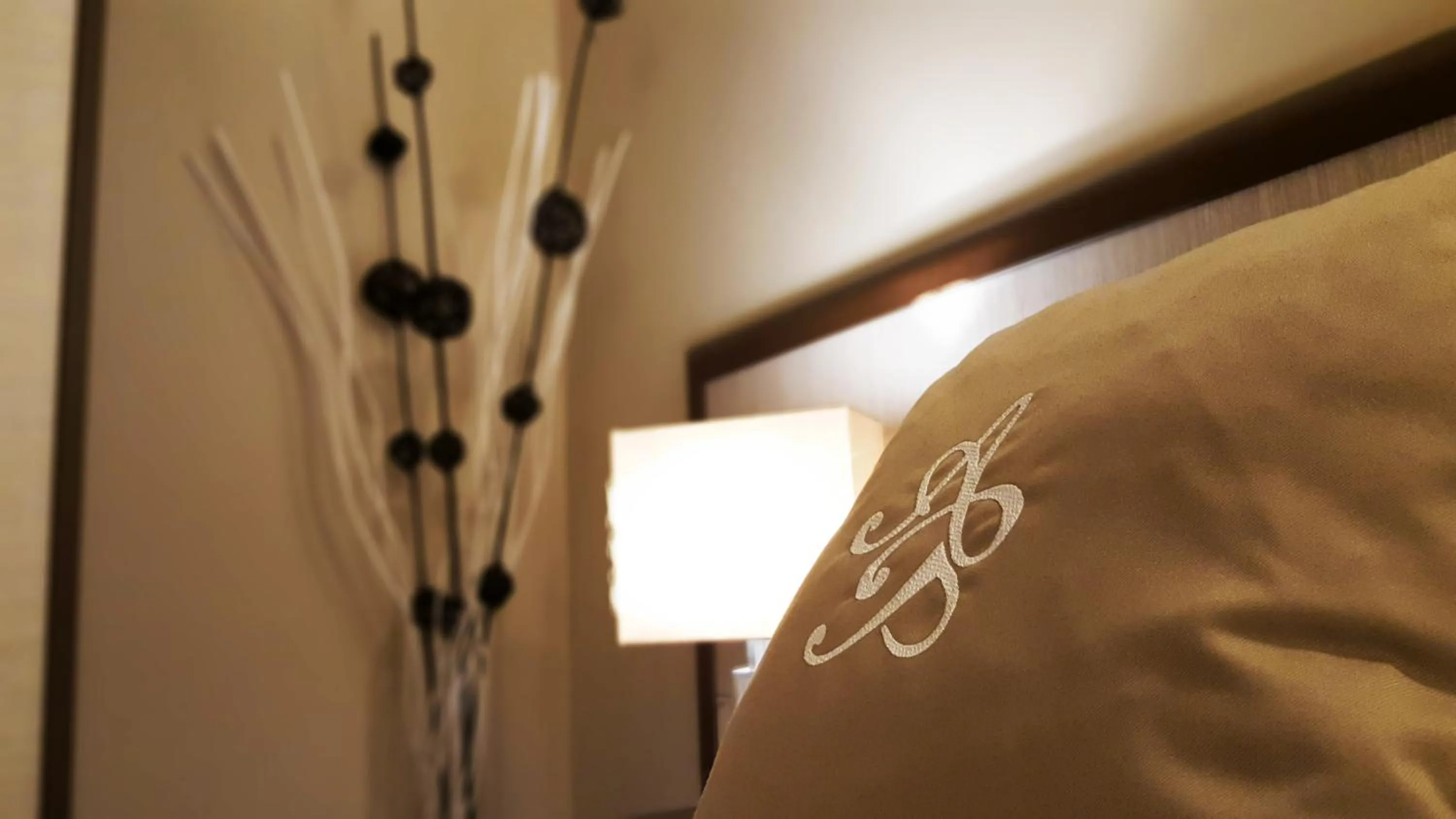 Property logo or sign, Bed in Attico Barocco