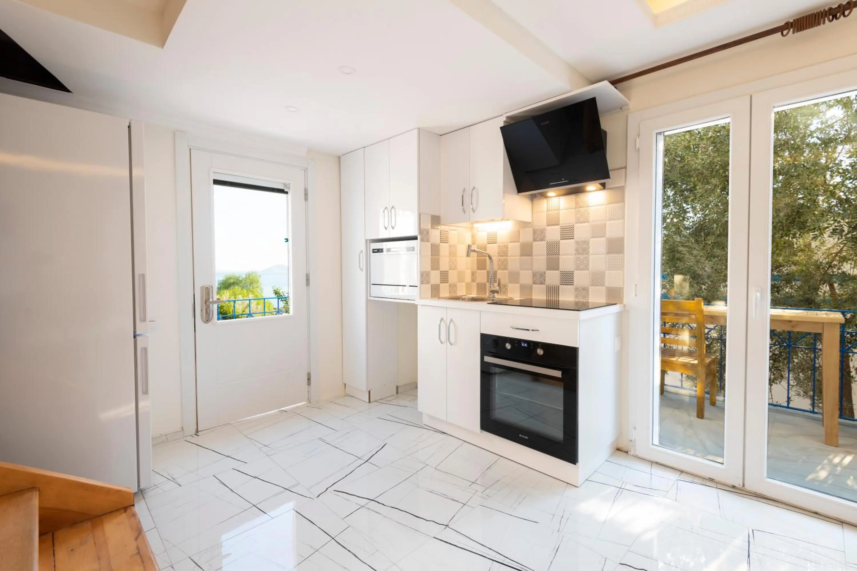 Kitchen or kitchenette in Soothe Hotel