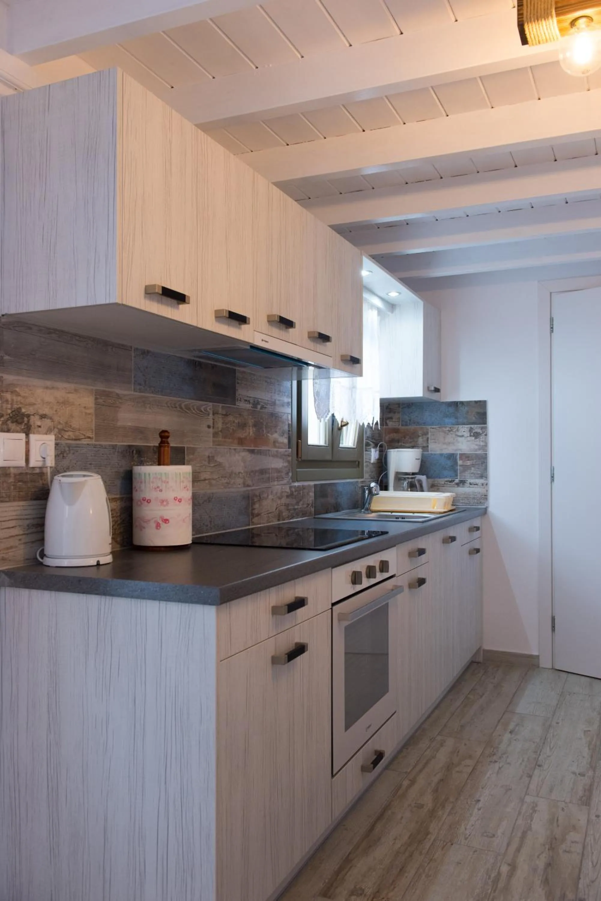 Kitchen or kitchenette in Pension Afroditi