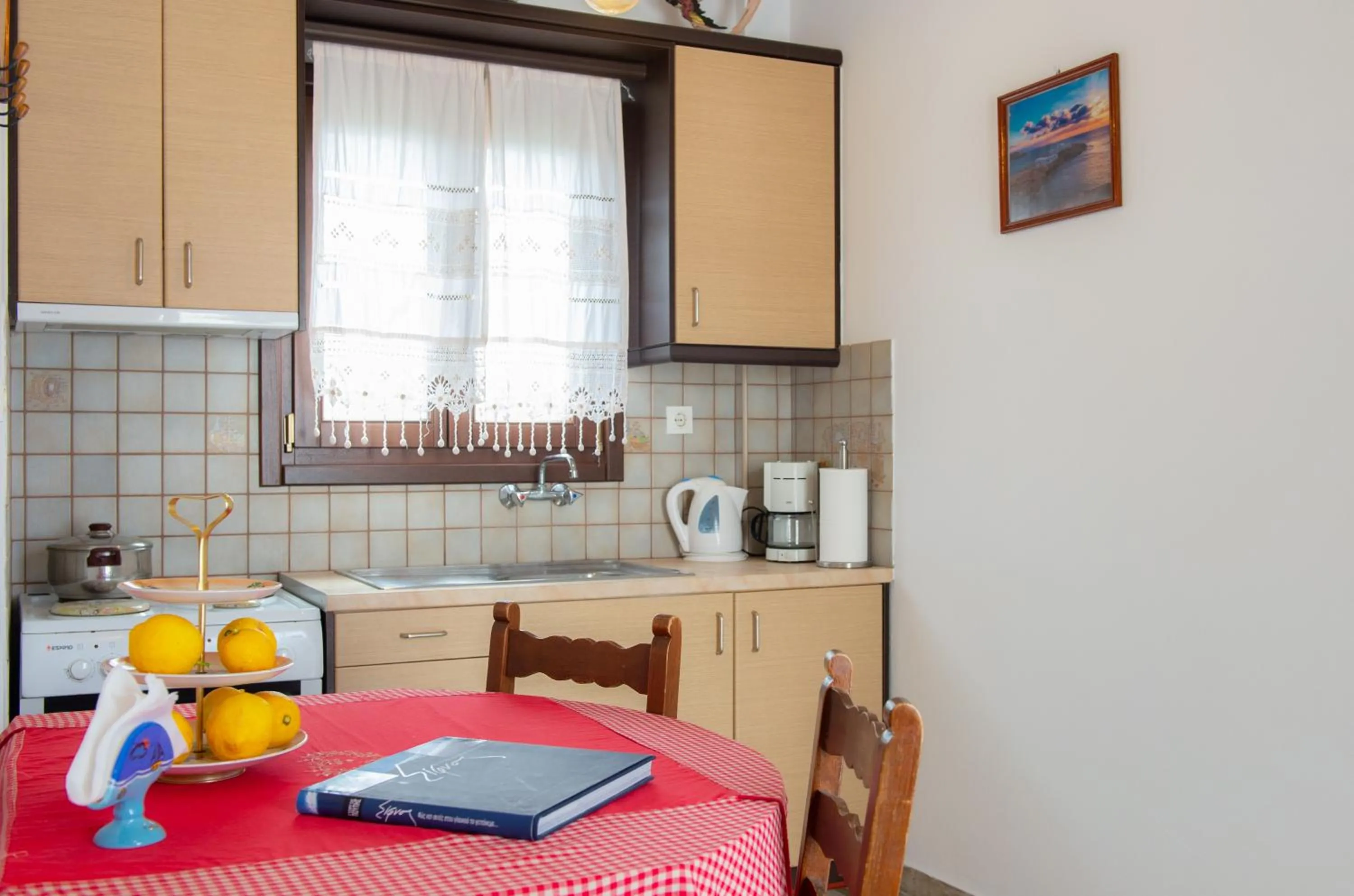 Kitchen or kitchenette in Pension Afroditi