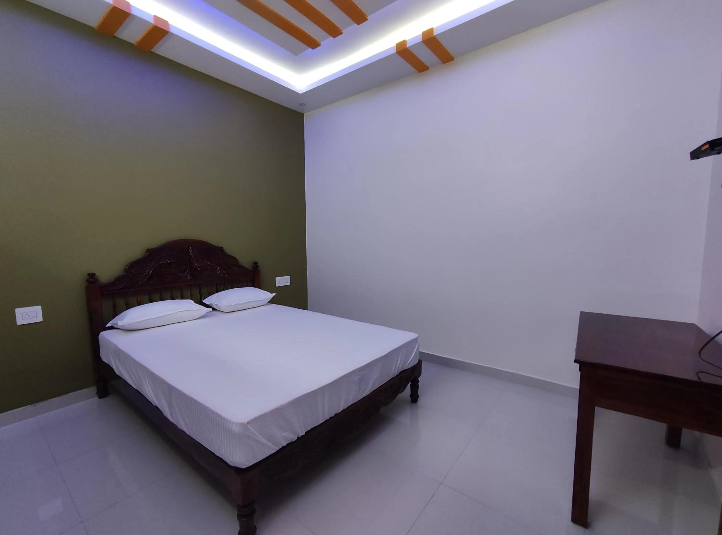 Bed in Kayaloram Resort