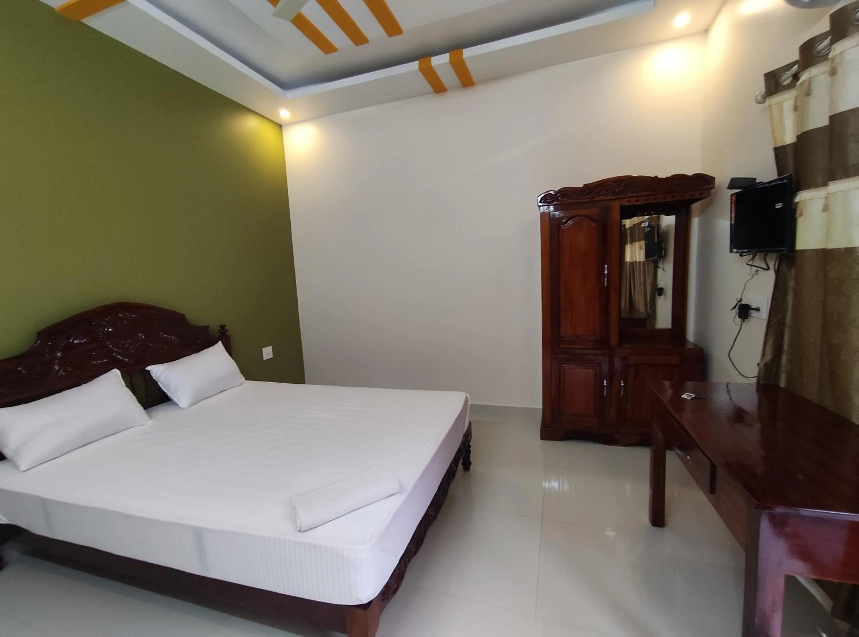 Bed in Kayaloram Resort