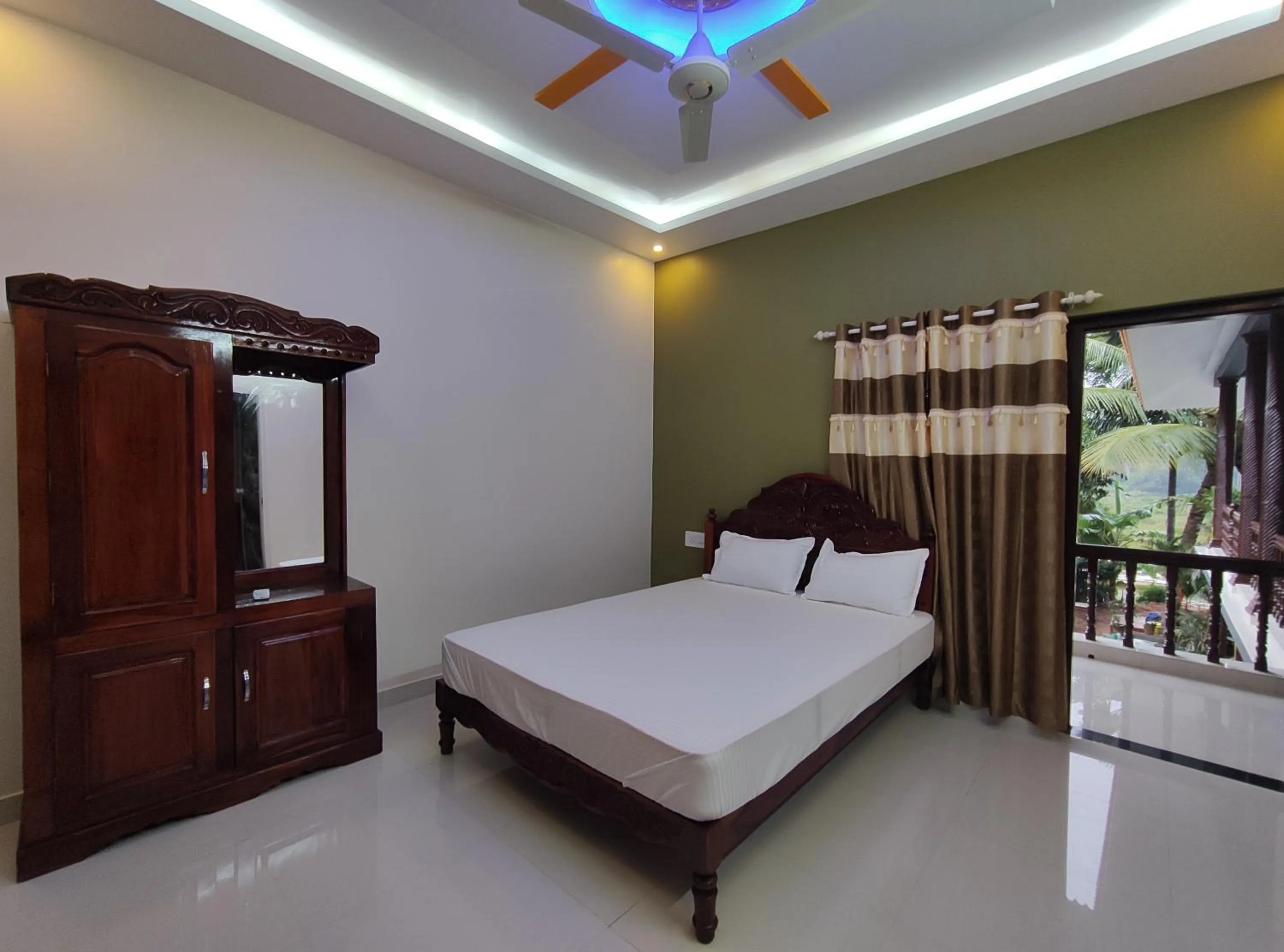 Bed in Kayaloram Resort