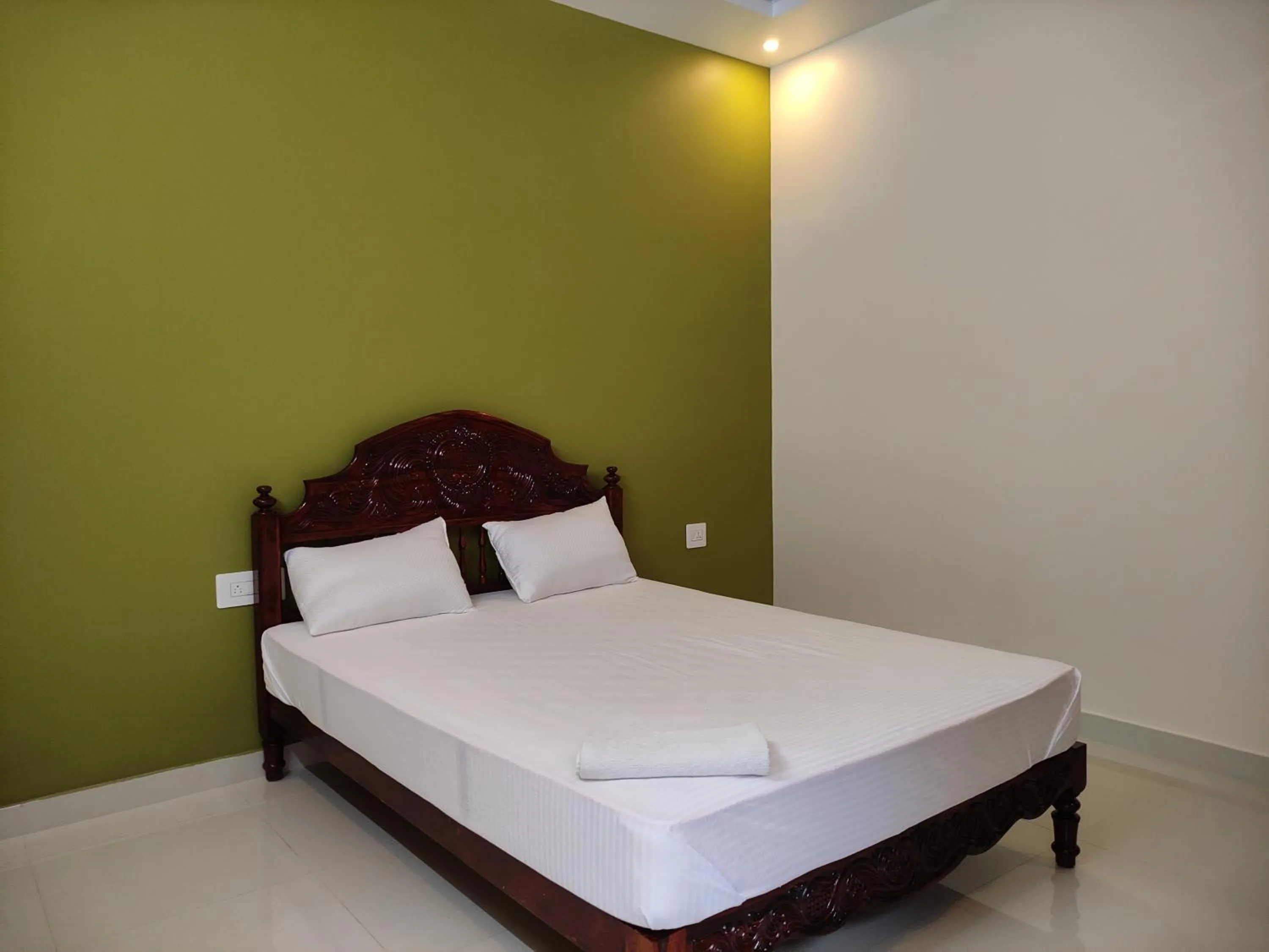 Bed in Kayaloram Resort