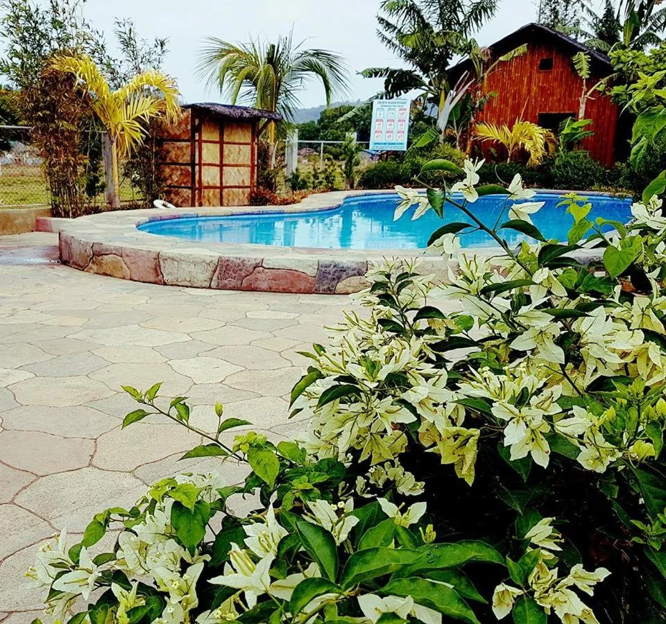 Swimming pool in Calayo Beach Resort