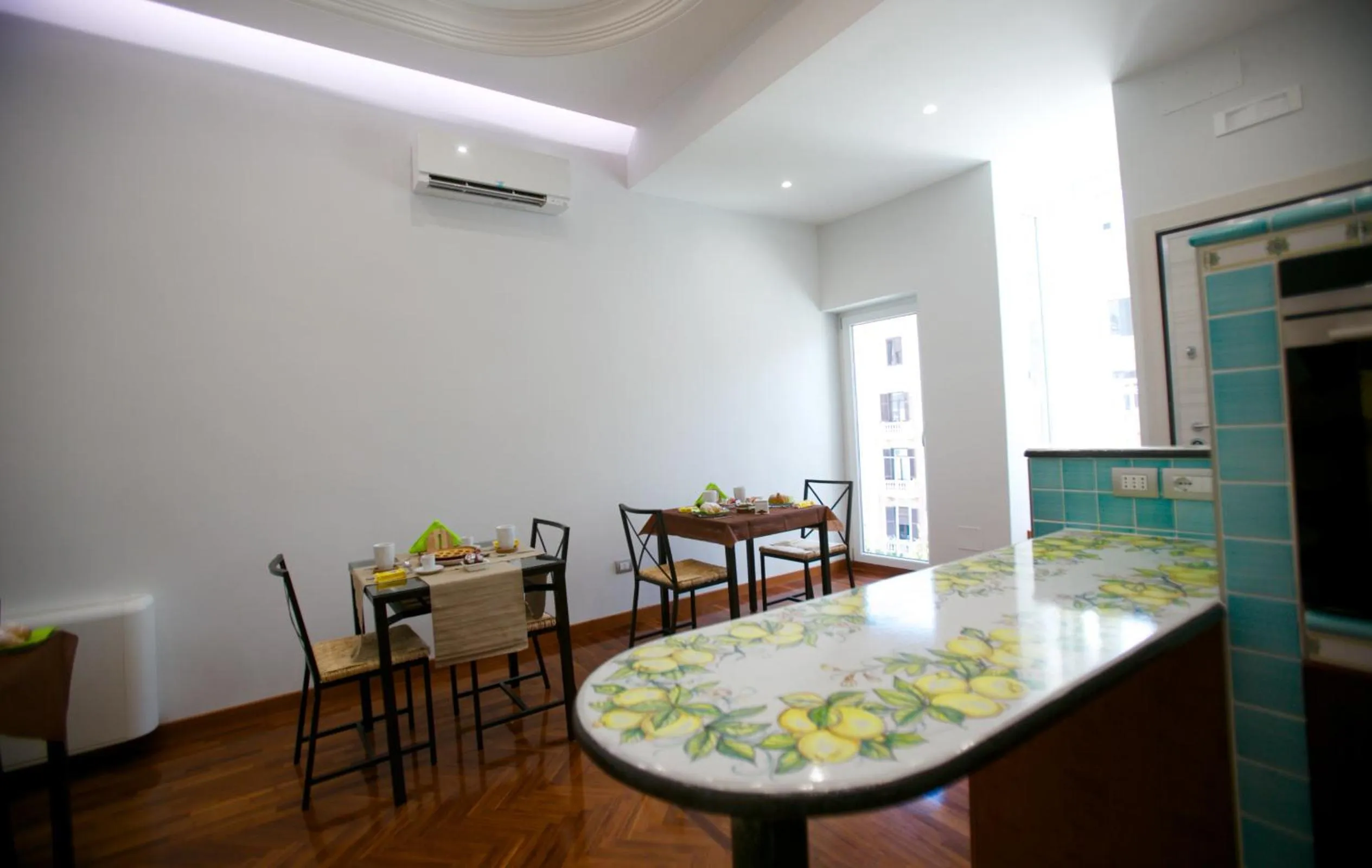 Communal lounge/ TV room in B&B Divina Salerno