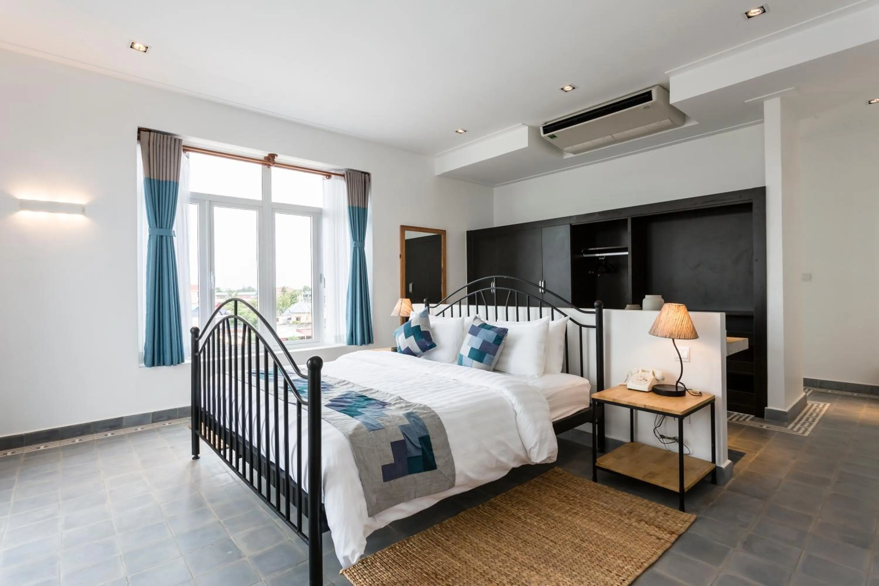 Bedroom in Boutique Kampot Hotel