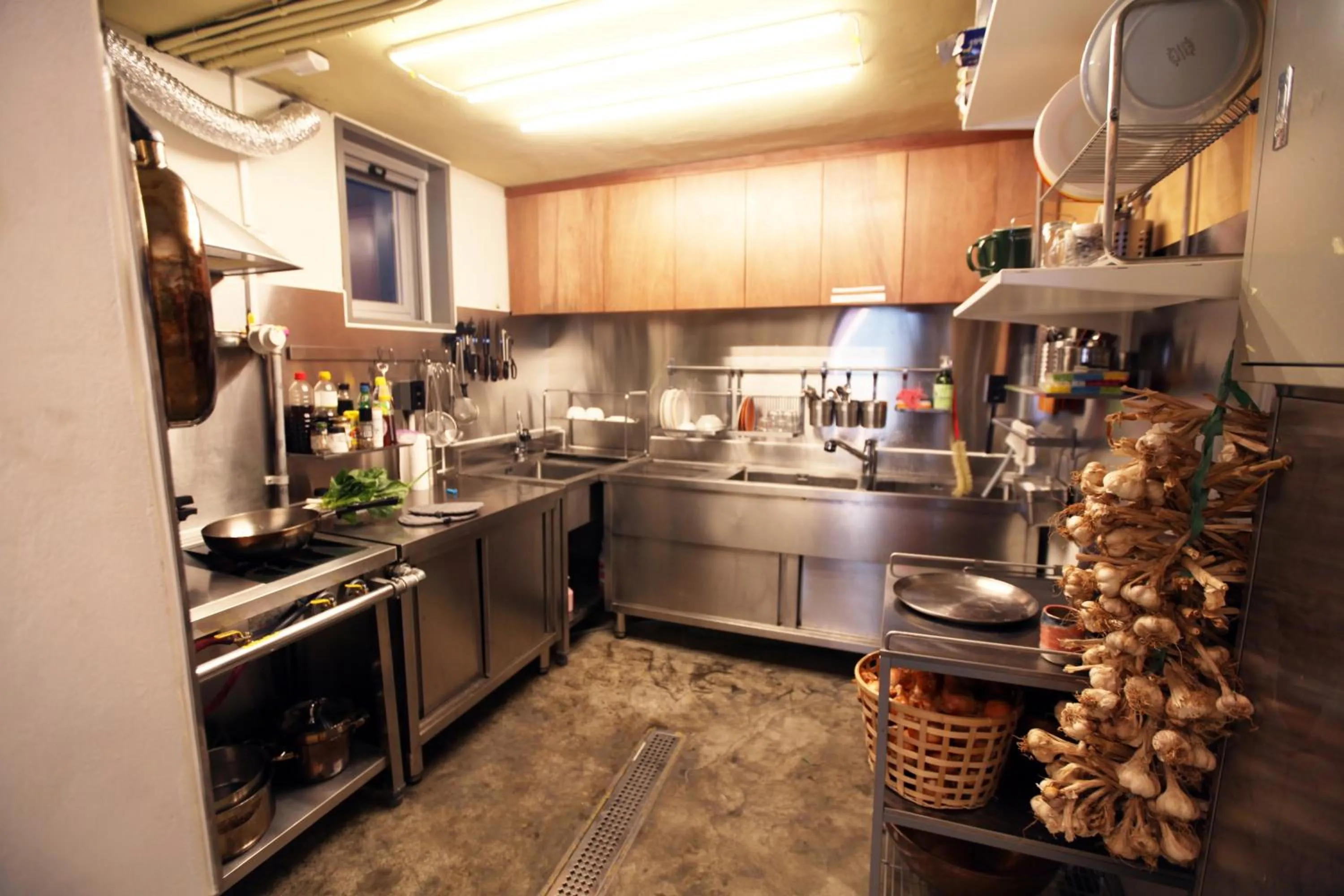 Kitchen or kitchenette in Hongdae Guesthouse Pajamaparty