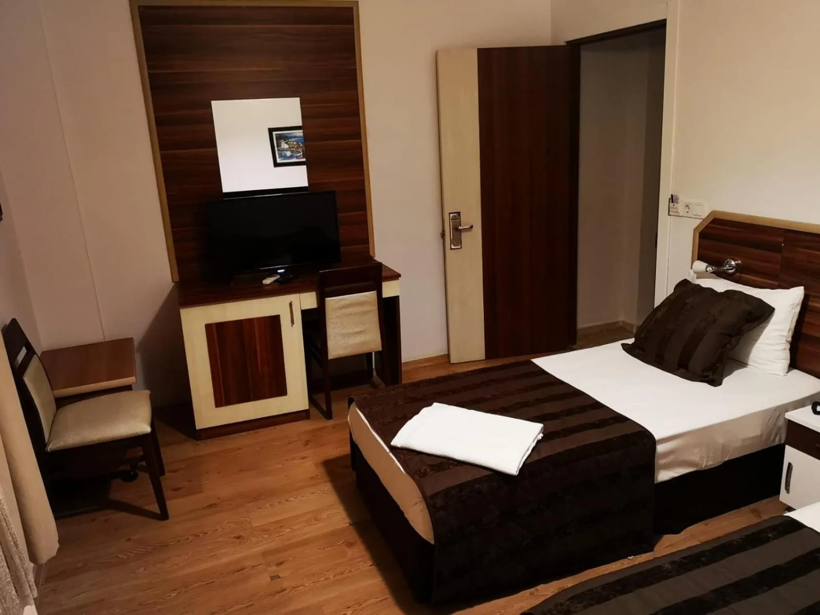 Photo of the whole room, Bed in Angels Garden Hotel - Special Catagory