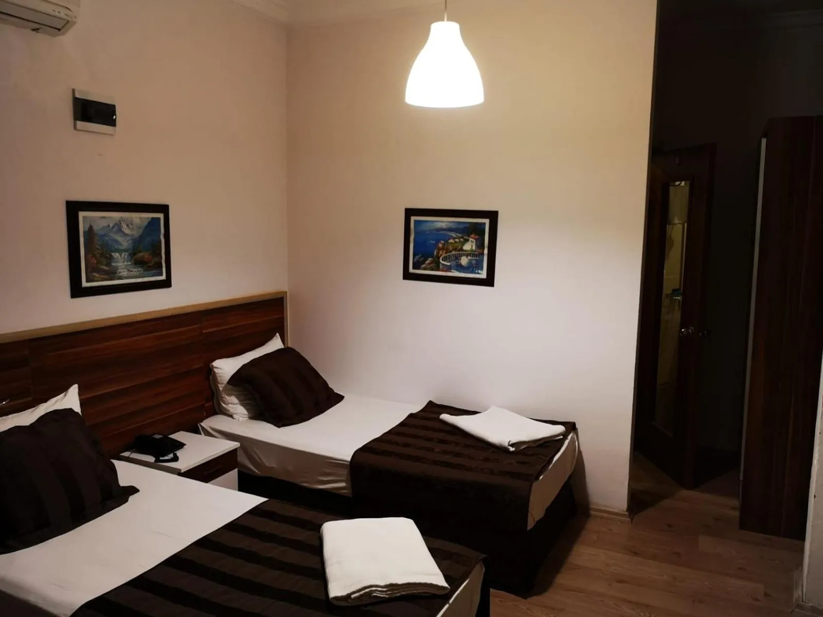 Photo of the whole room, Bed in Angels Garden Hotel - Special Catagory