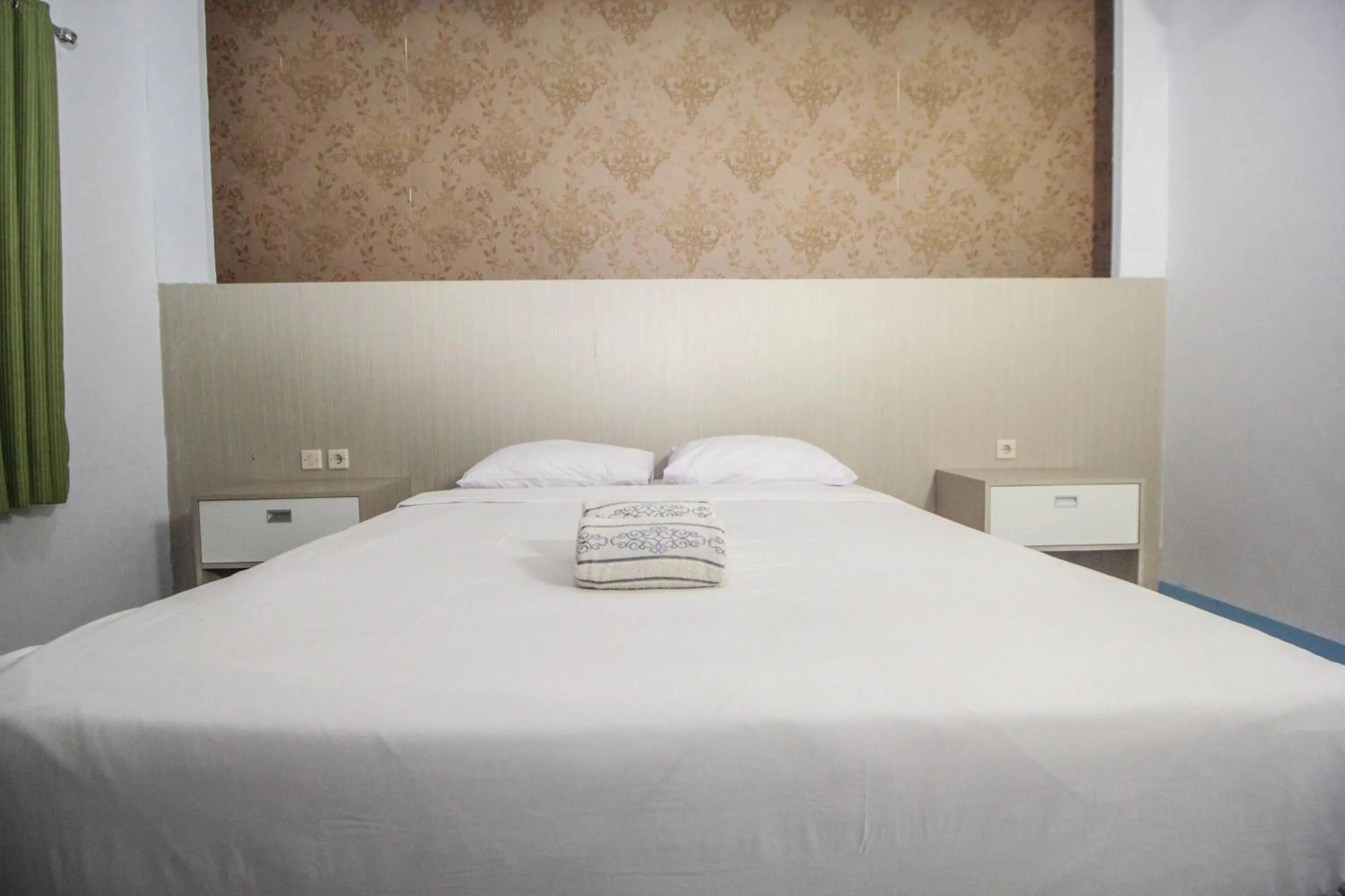 Bed in Allisa Resort Hotel