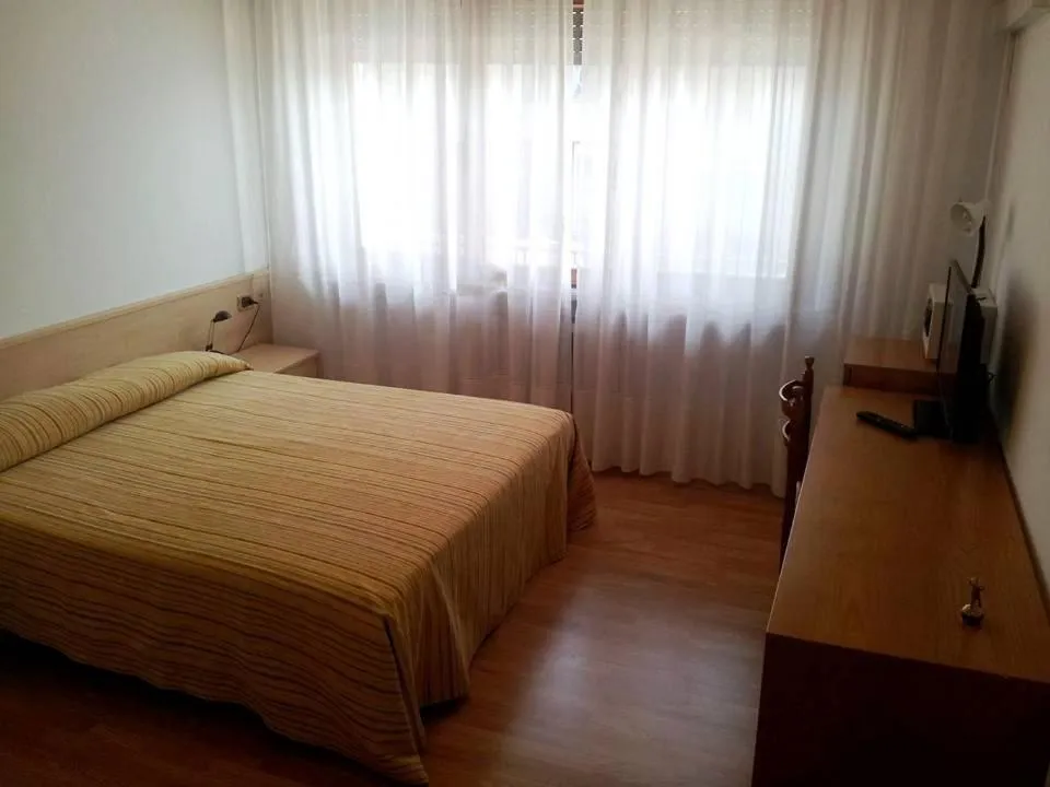 Photo of the whole room, Bed in Hotel Piol