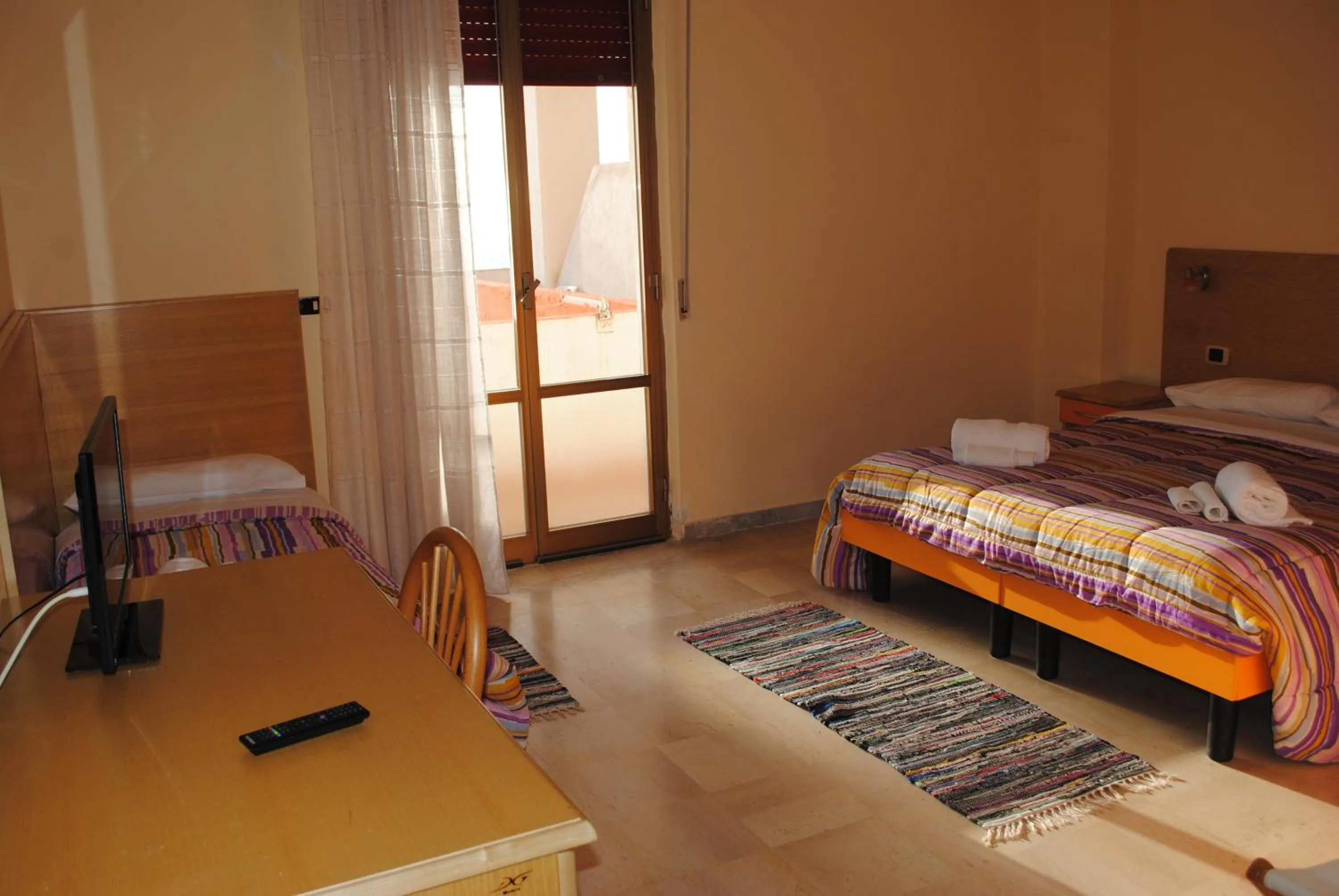 Bed in Hotel South Paradise