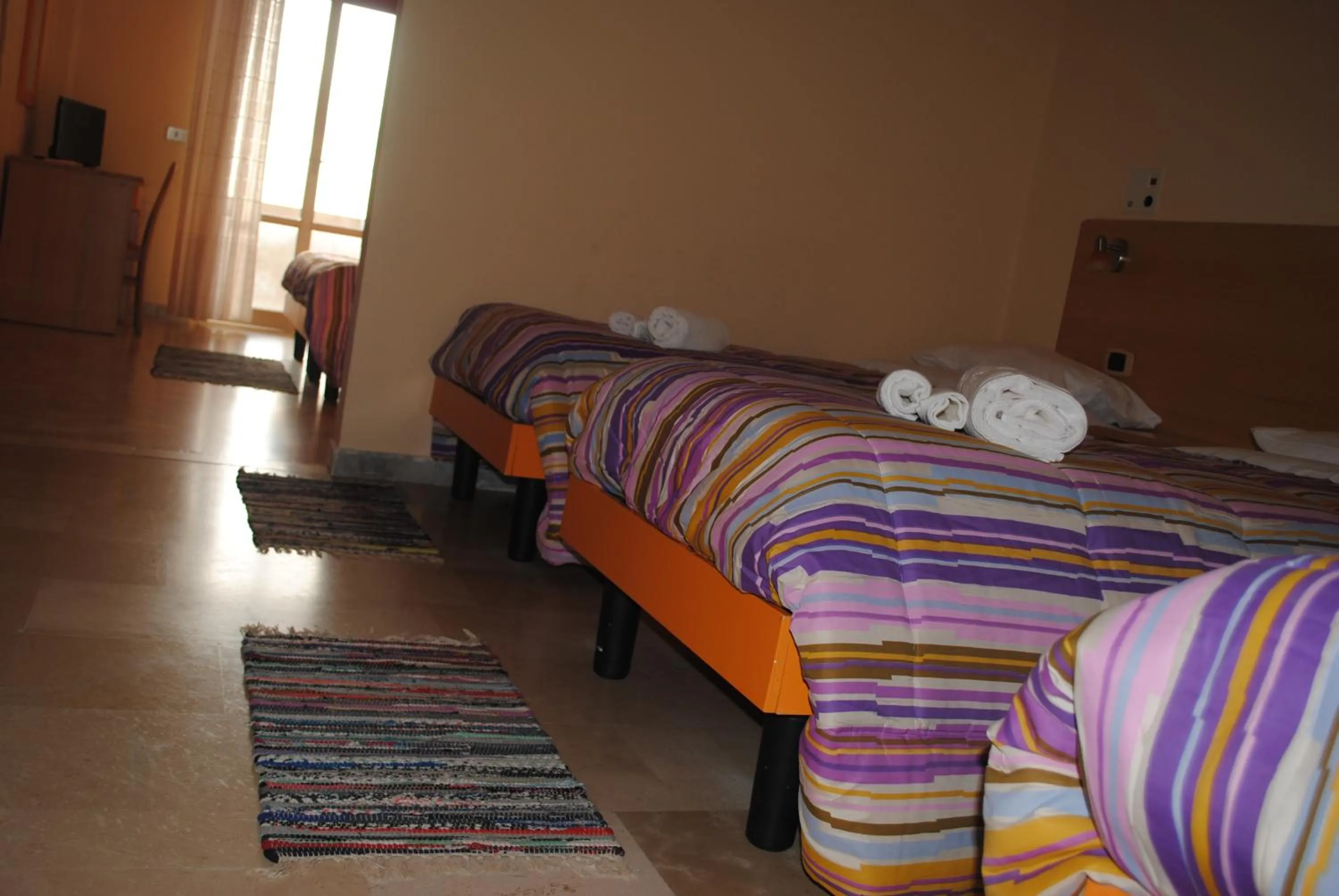 Bed in Hotel South Paradise