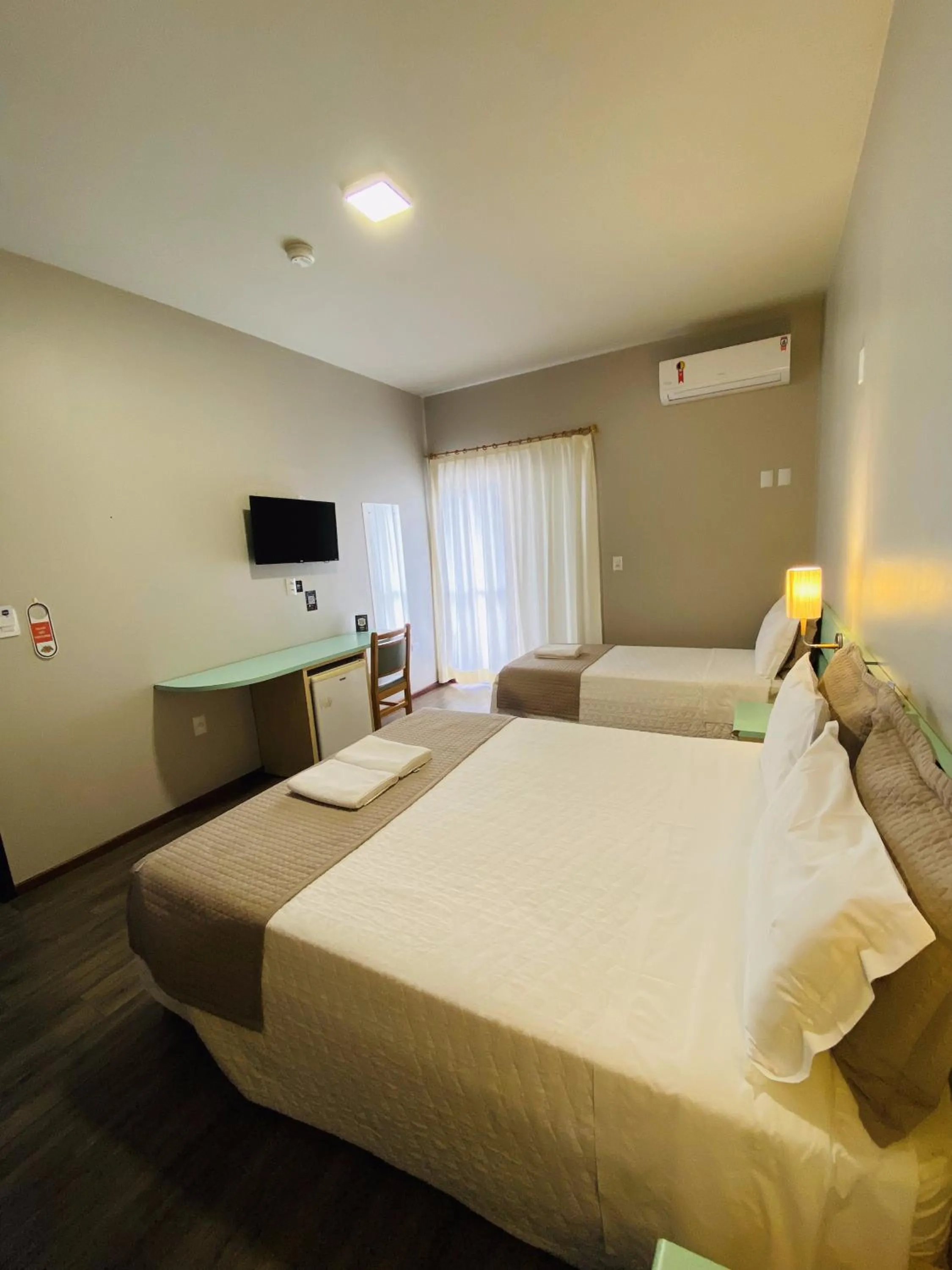 Bed in Real NOB Hotel