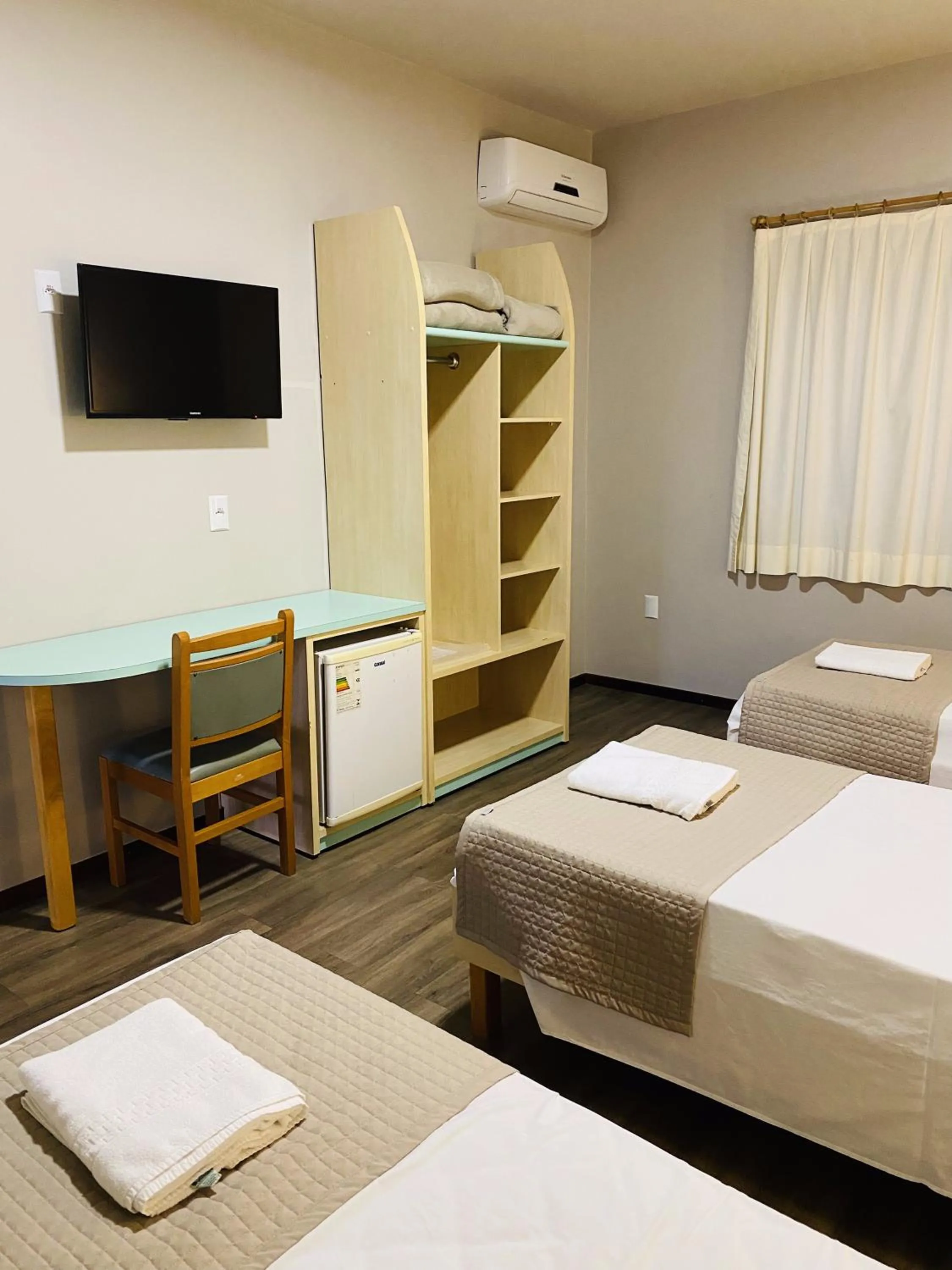 Bed in Real NOB Hotel