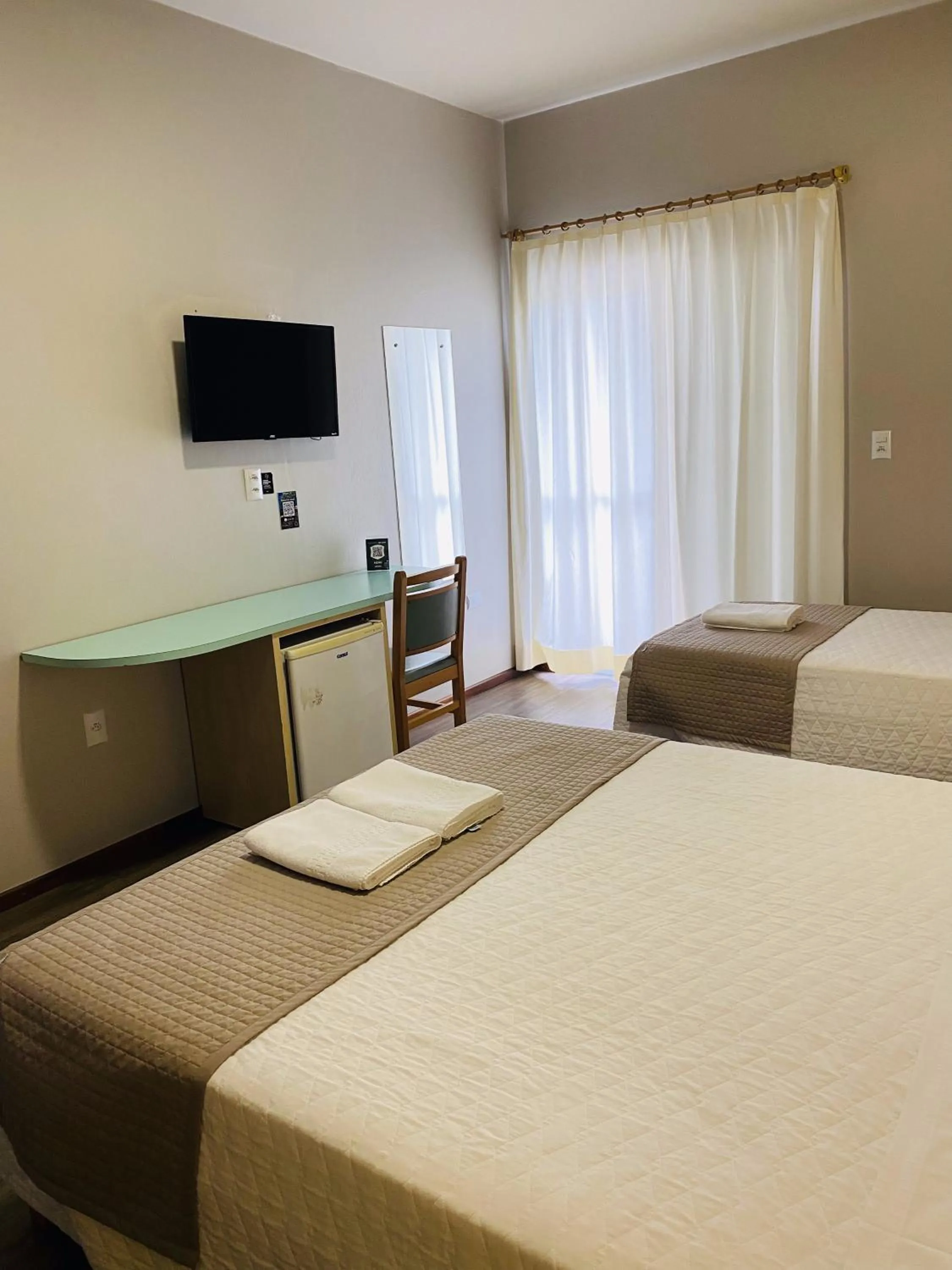 Bed in Real NOB Hotel