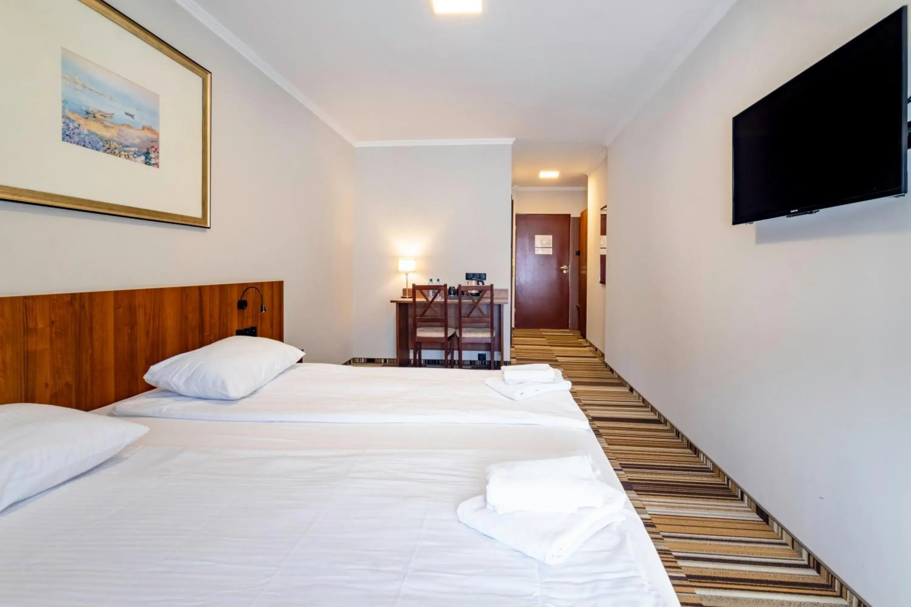 Communal lounge/ TV room, Bed in Hit Hotel Communal lounge/ TV room, Bed in Hit Hotel