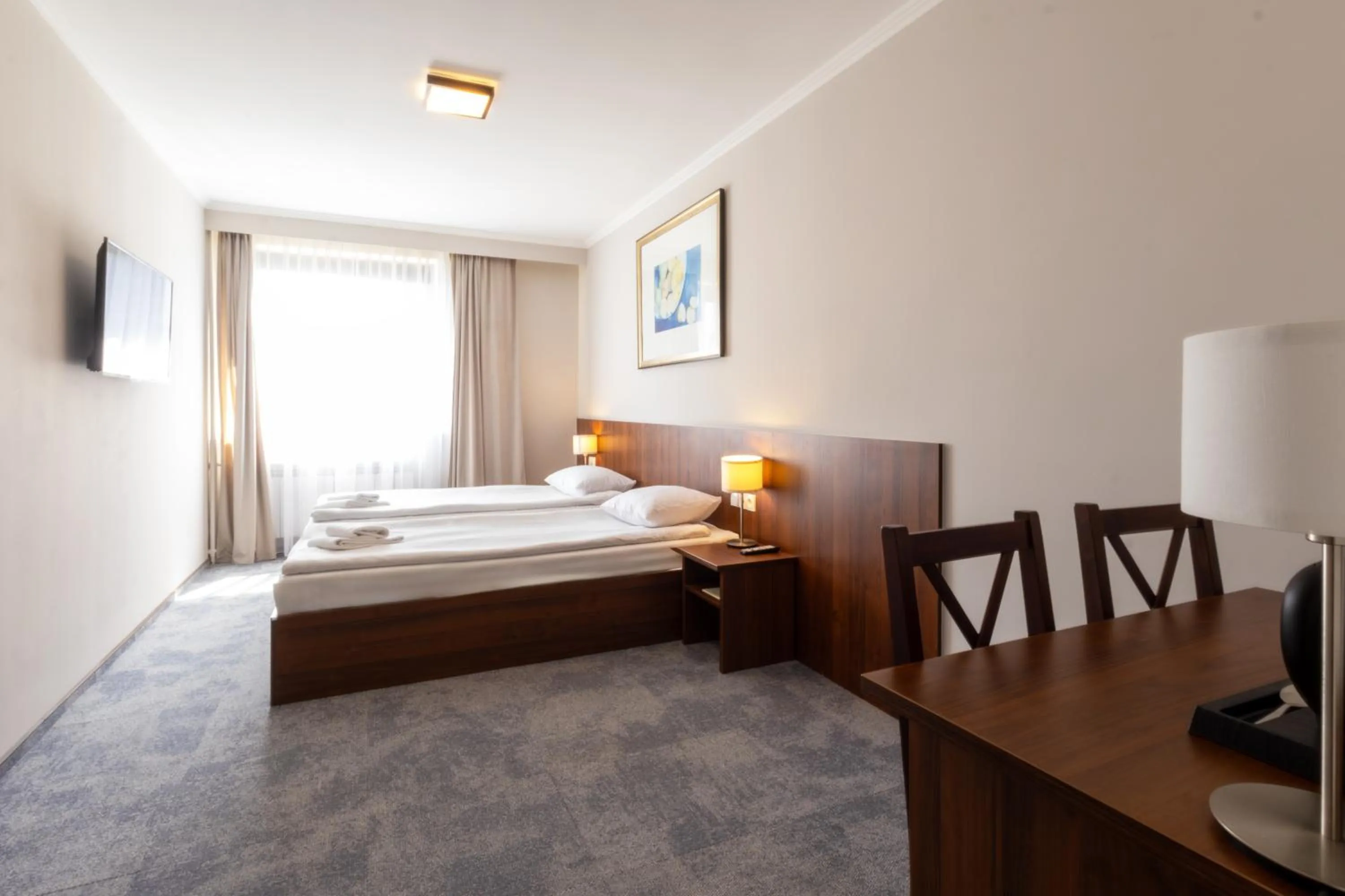 Communal lounge/ TV room, Bed in Hit Hotel