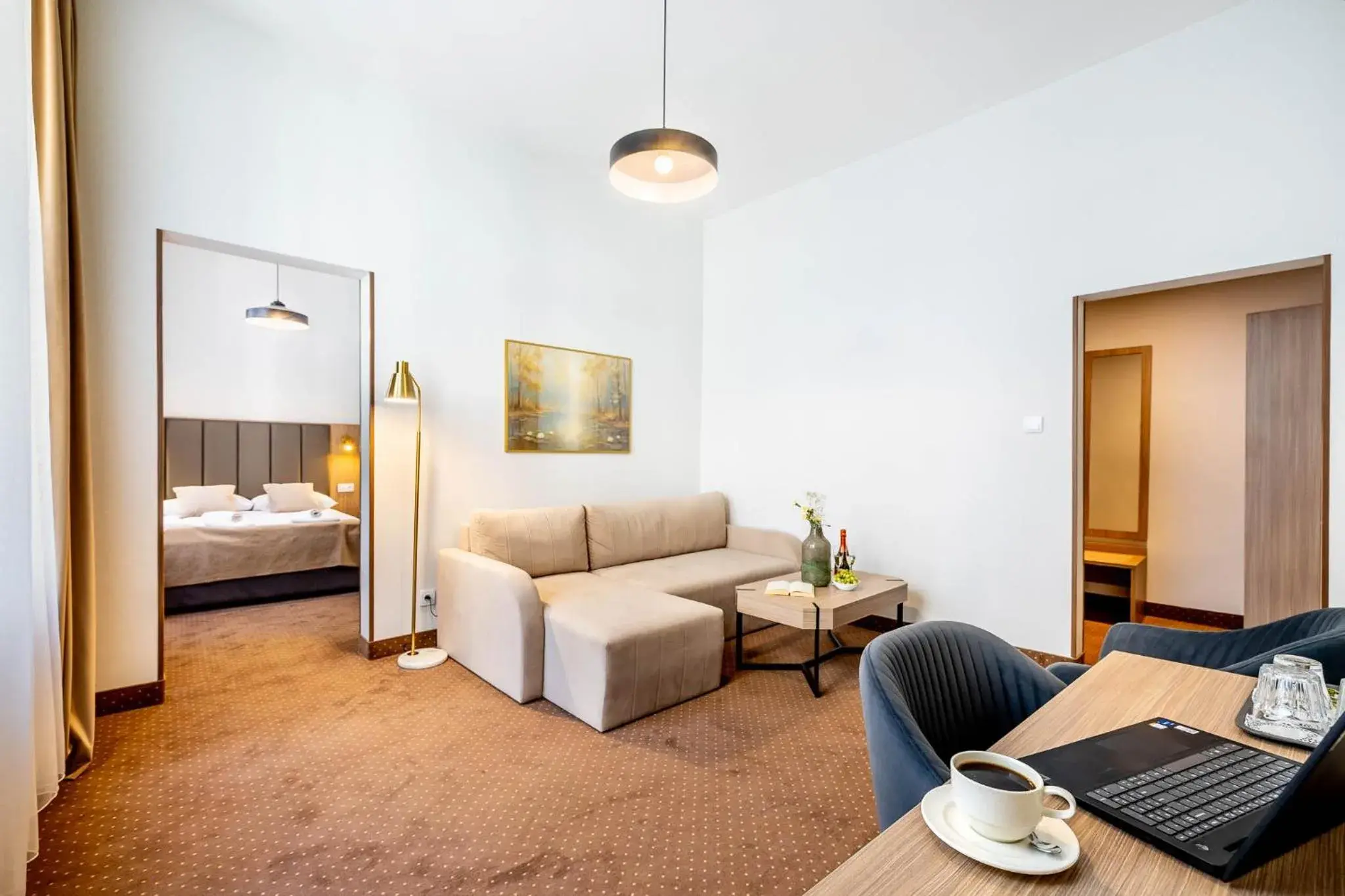 Seating area, Bed in Hotel Lothus Seating area, Bed in Hotel Lothus