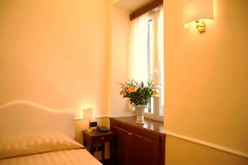 Bed in Luxury Ludovisi Rooms