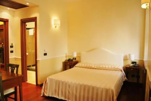 Bed in Luxury Ludovisi Rooms