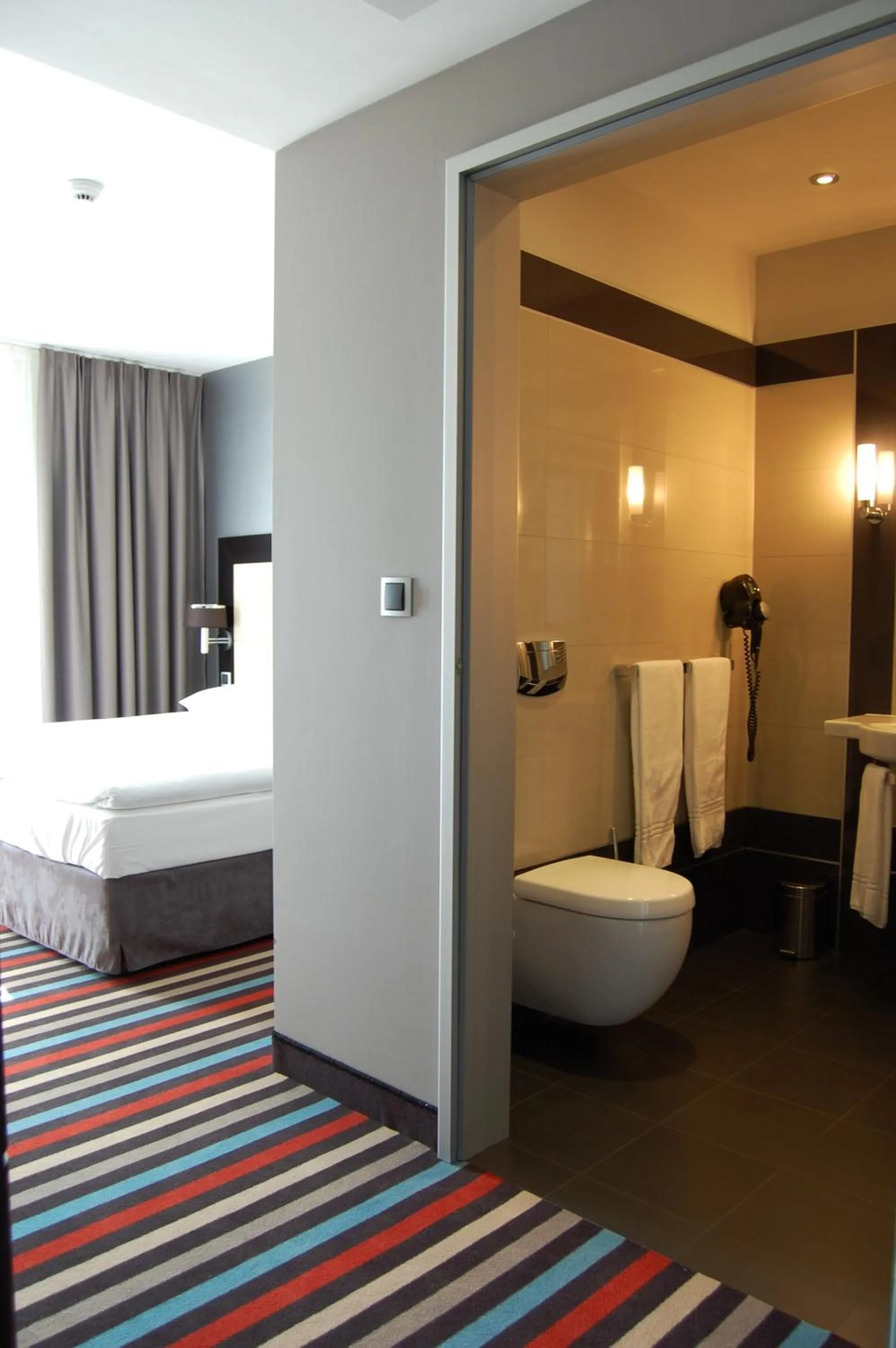 Toilet, Bed in Silver Hotel & Gokart Center