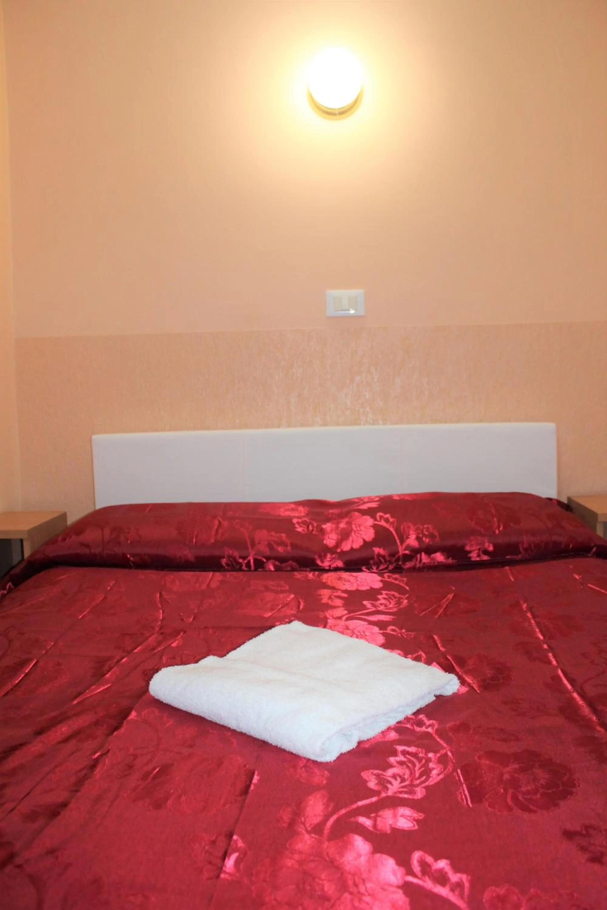 Bed in Hotel Eurorooms