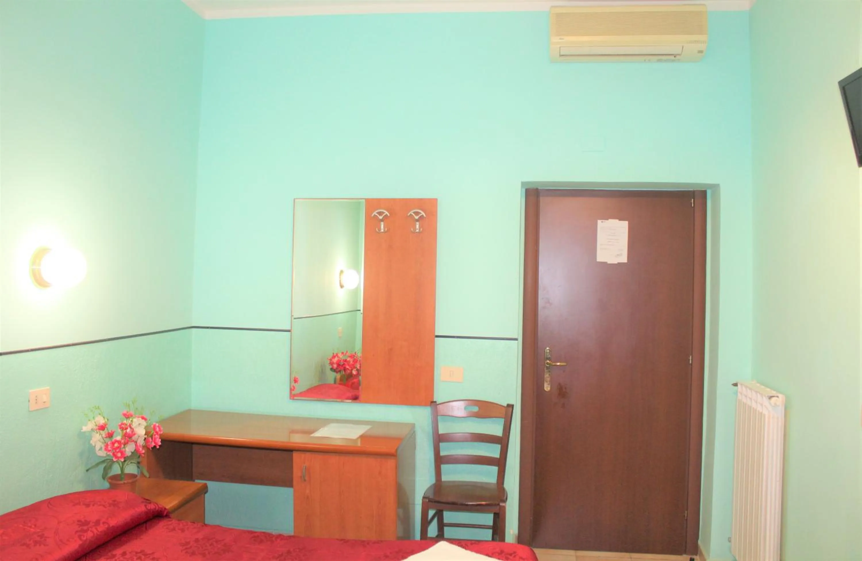 Bed in Hotel Eurorooms