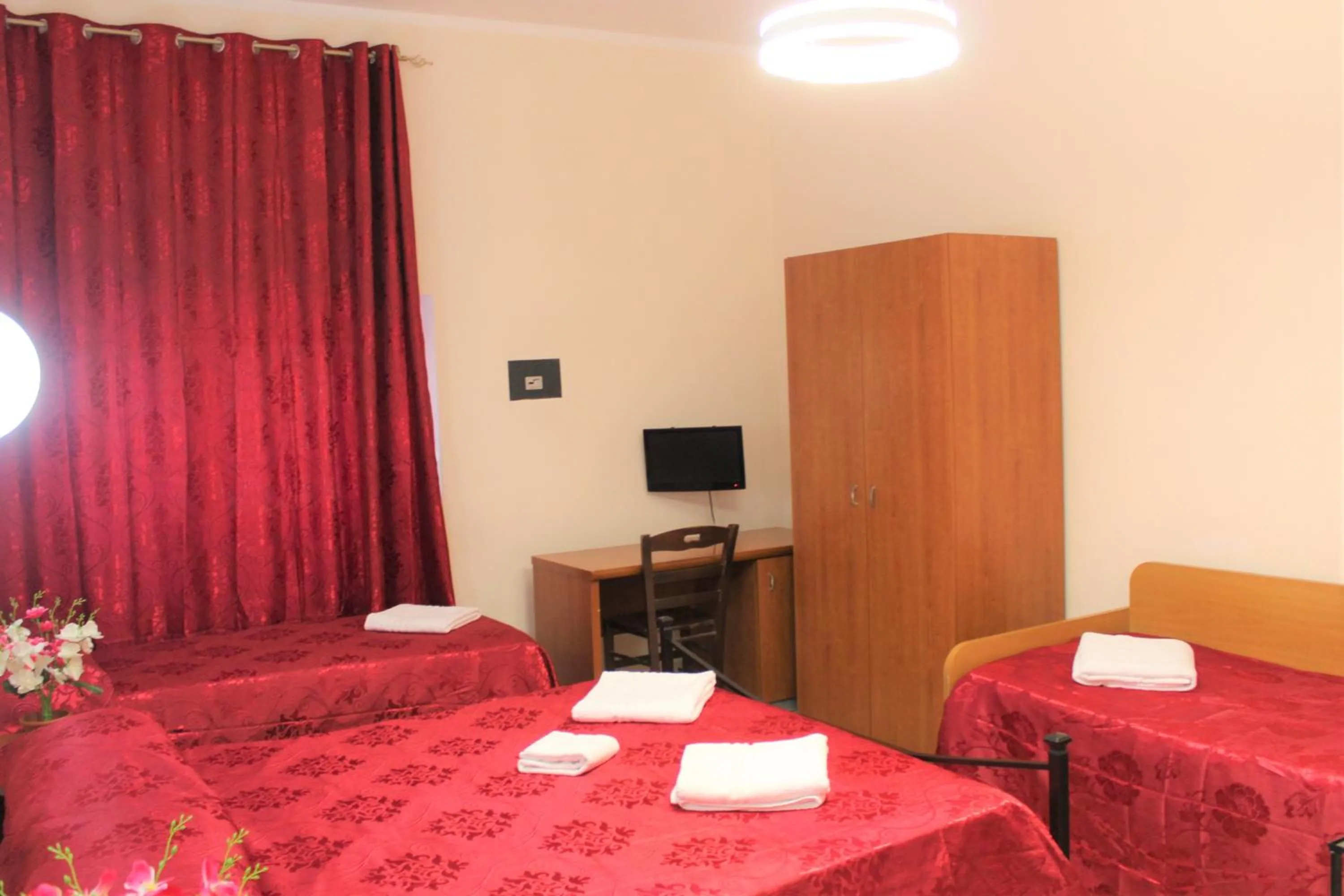 Bed in Hotel Eurorooms