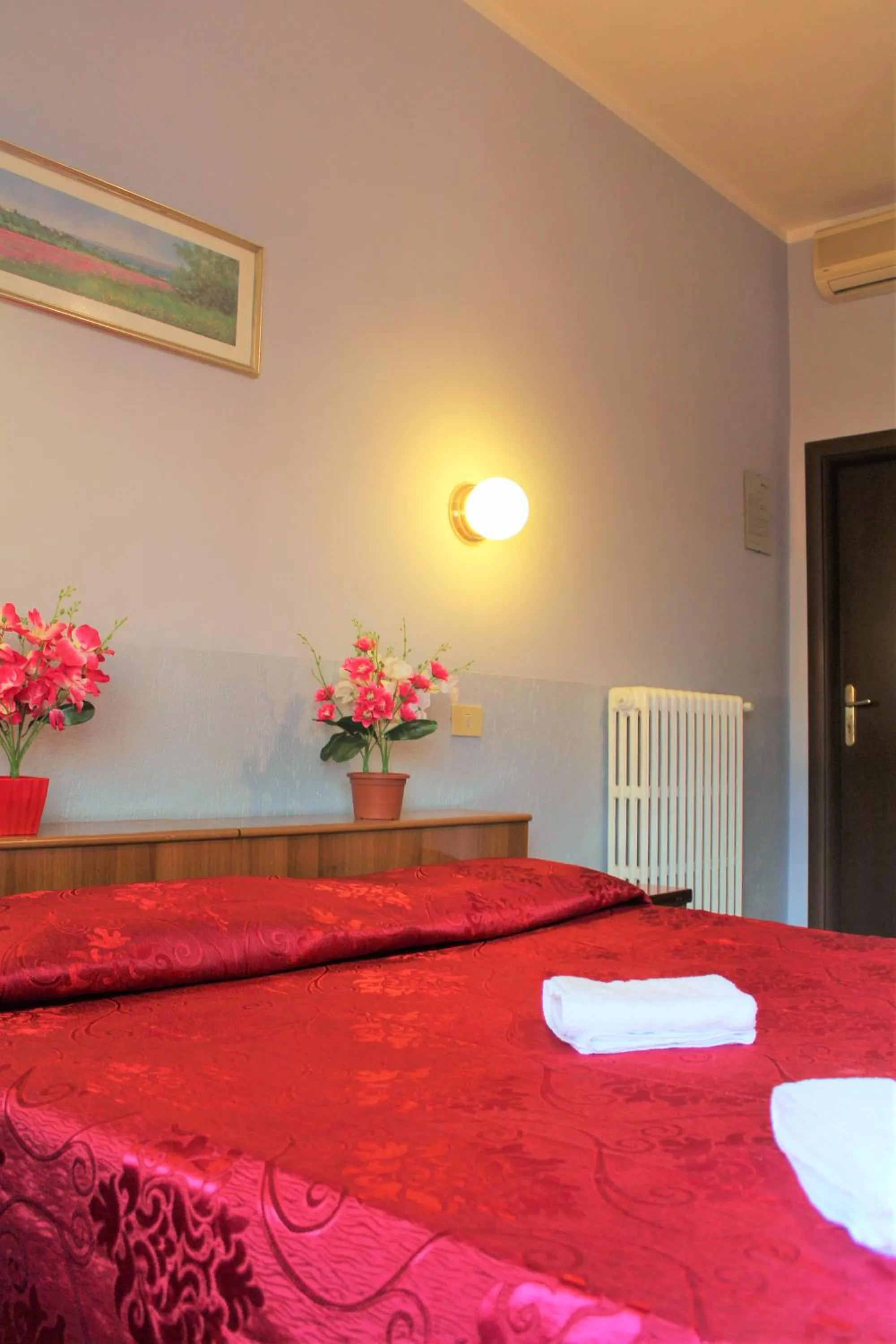 Bed in Hotel Eurorooms