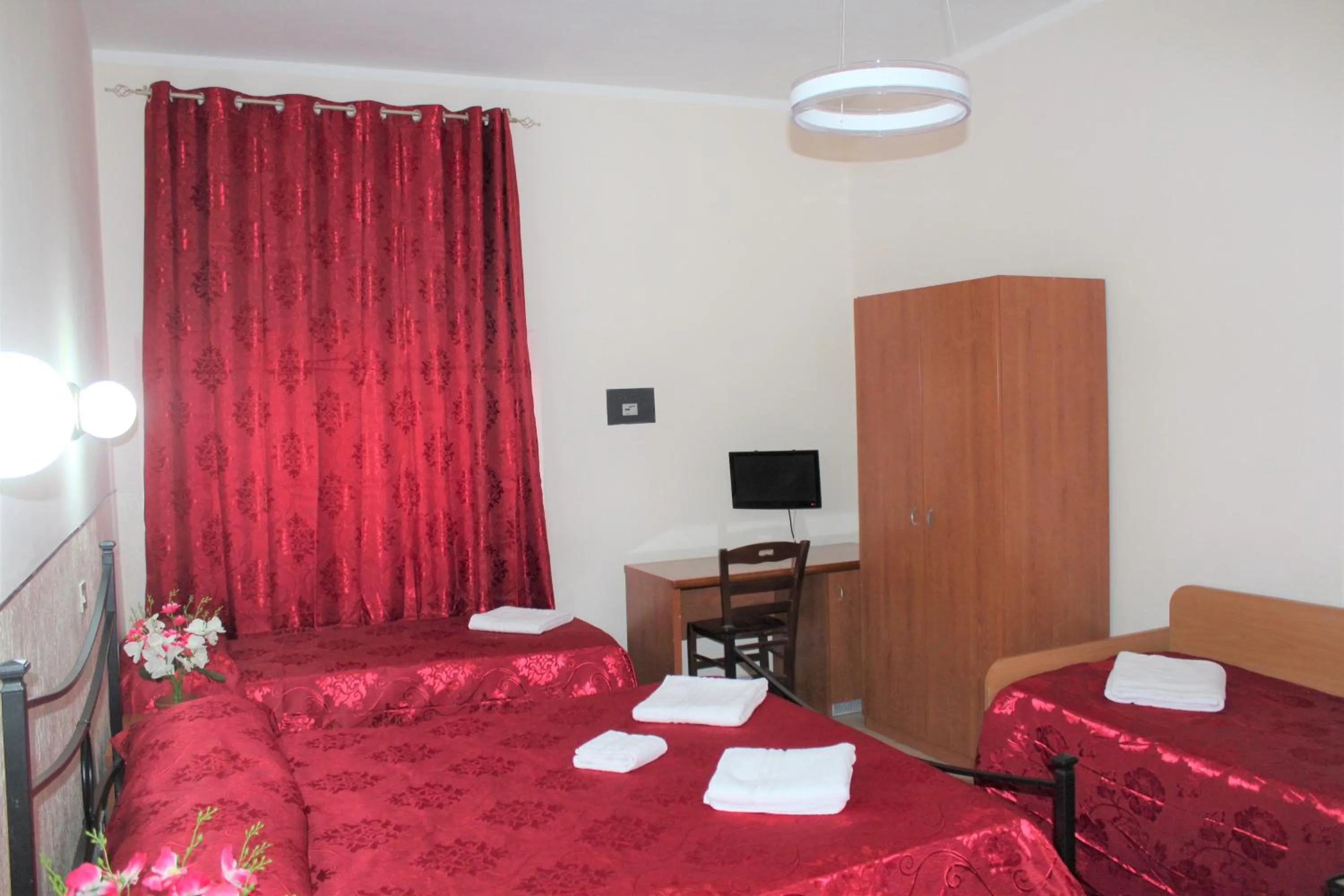 Bed in Hotel Eurorooms