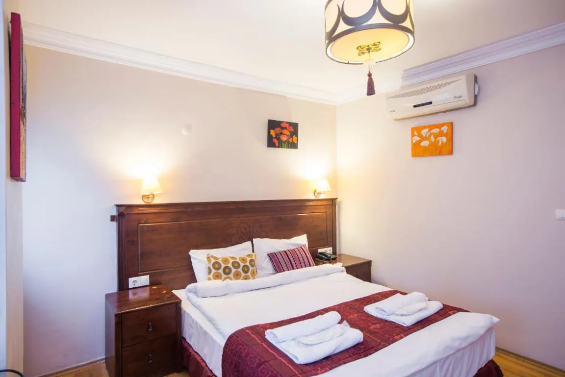 Bed in Berce Apartments