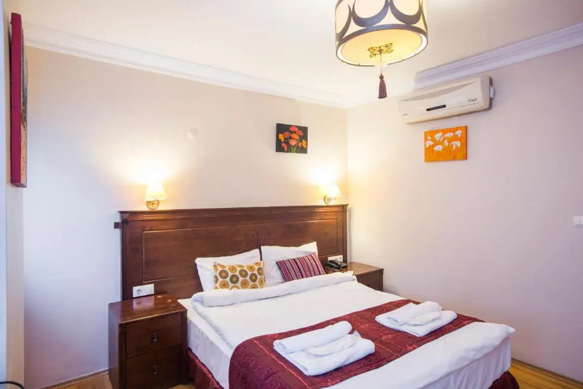 Bed in Berce Apartments Bed in Berce Apartments