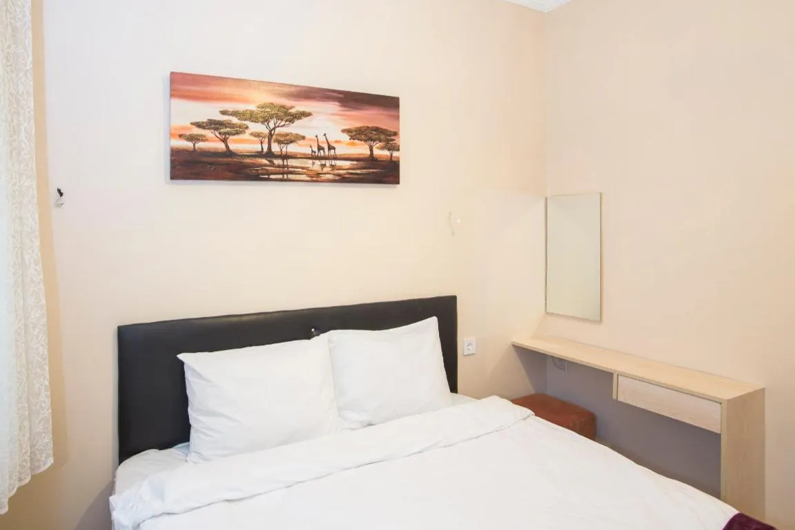 Bed in Berce Apartments