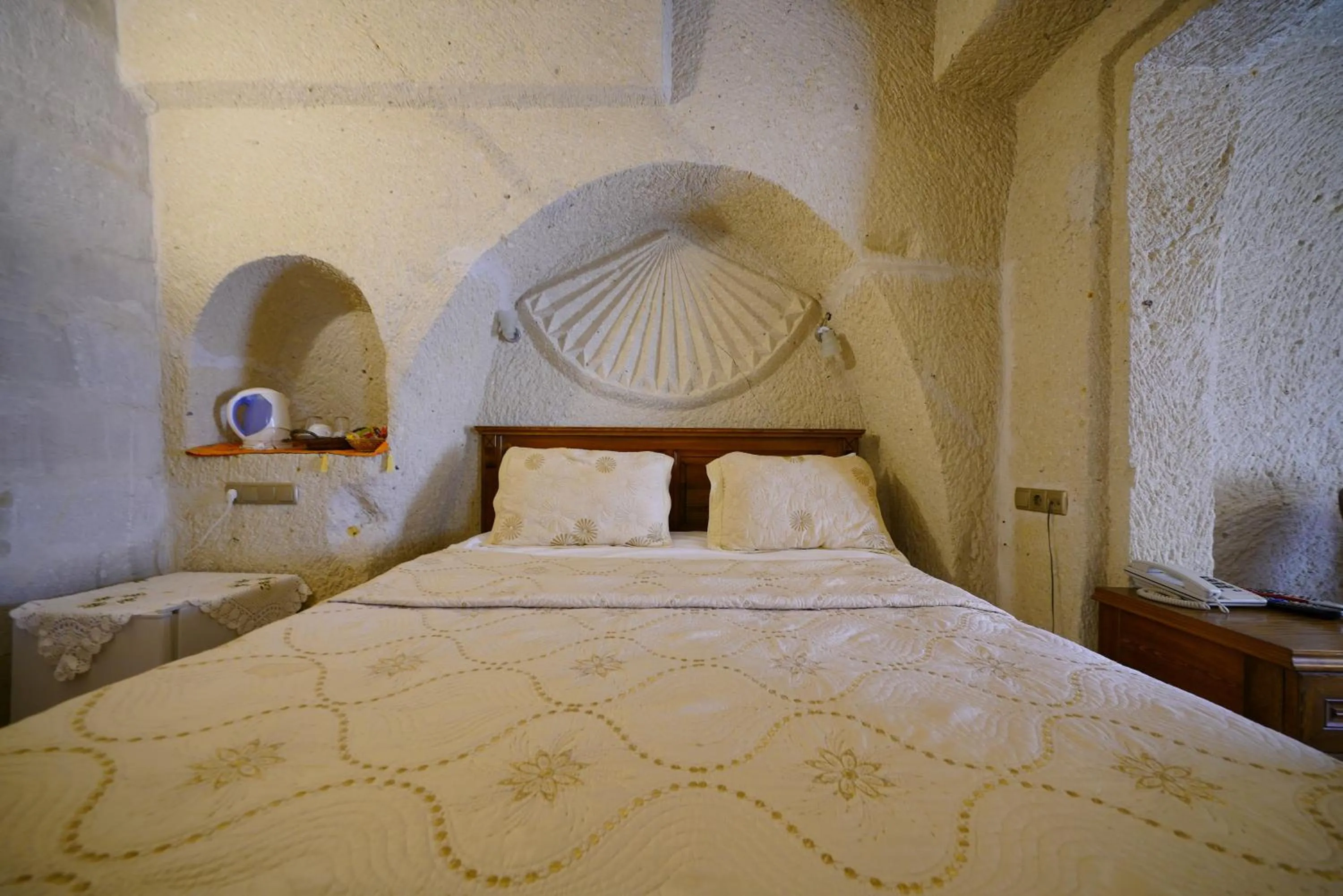 Bed in Vezir Cave Suites