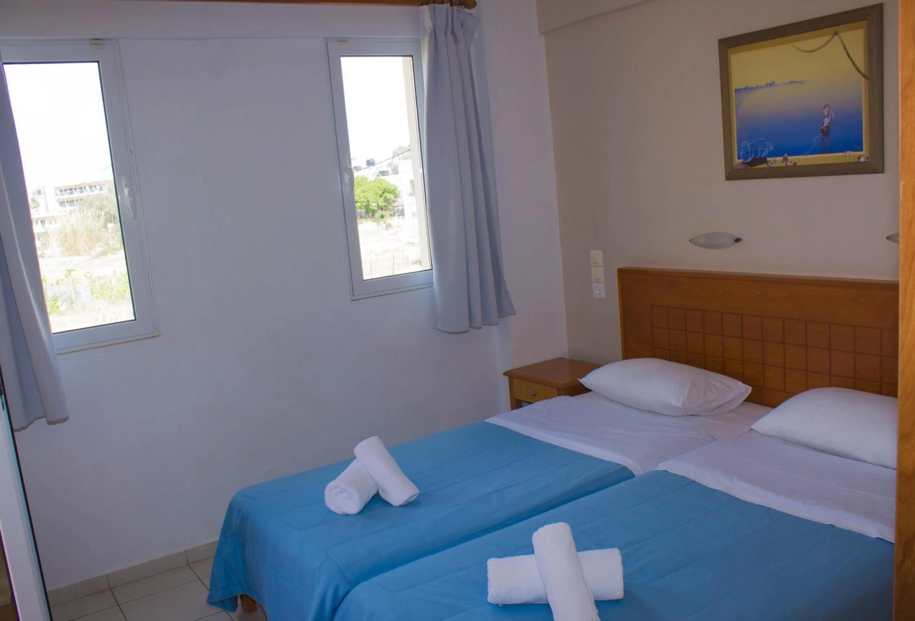 Bedroom in Sunshine Studios & Apartments