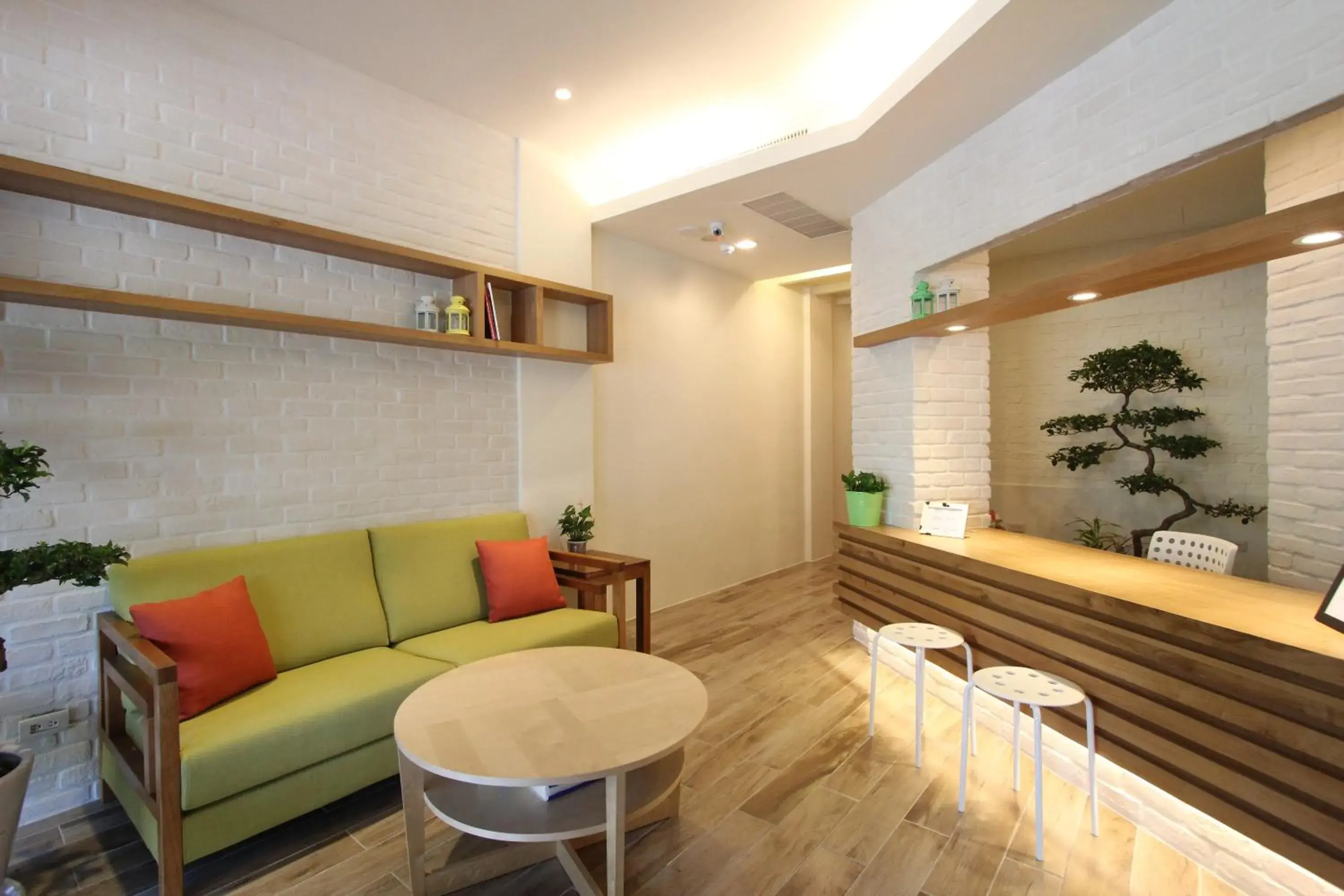 Communal lounge/ TV room in Muguang Inn Communal lounge/ TV room in Muguang Inn