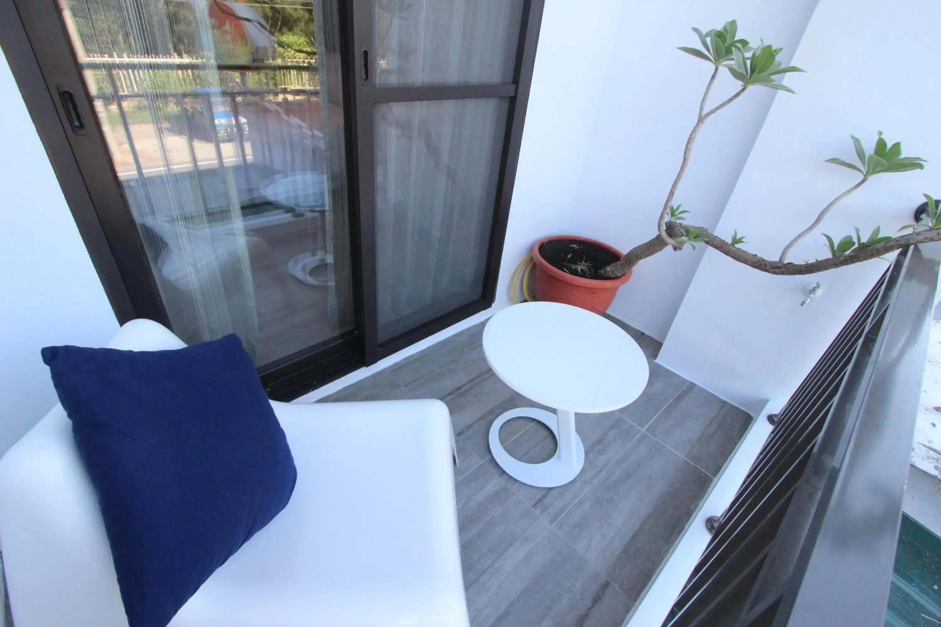 Balcony/Terrace, Bed in Muguang Inn Balcony/Terrace, Bed in Muguang Inn