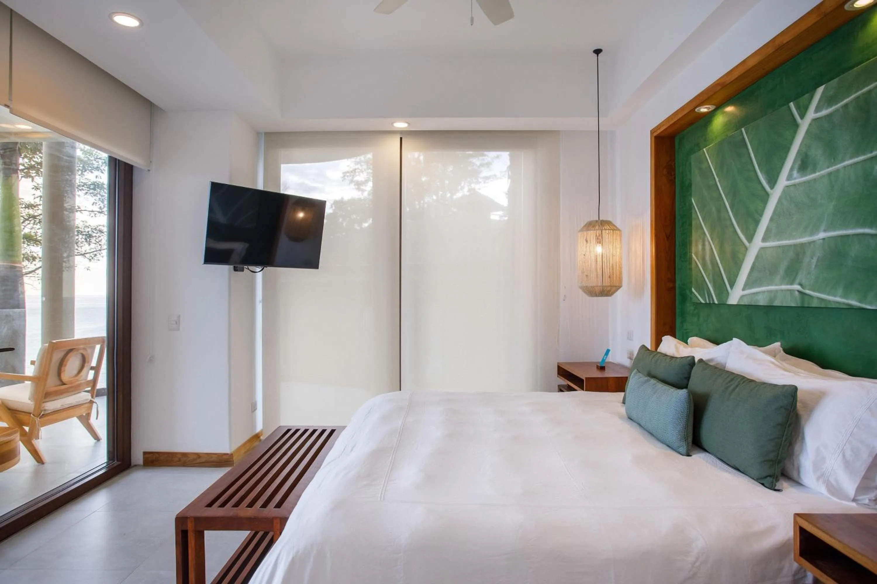 Photo of the whole room, Bed in Arenas Del Mar Beachfront & Rainforest Resort Member of the Cayuga Collection