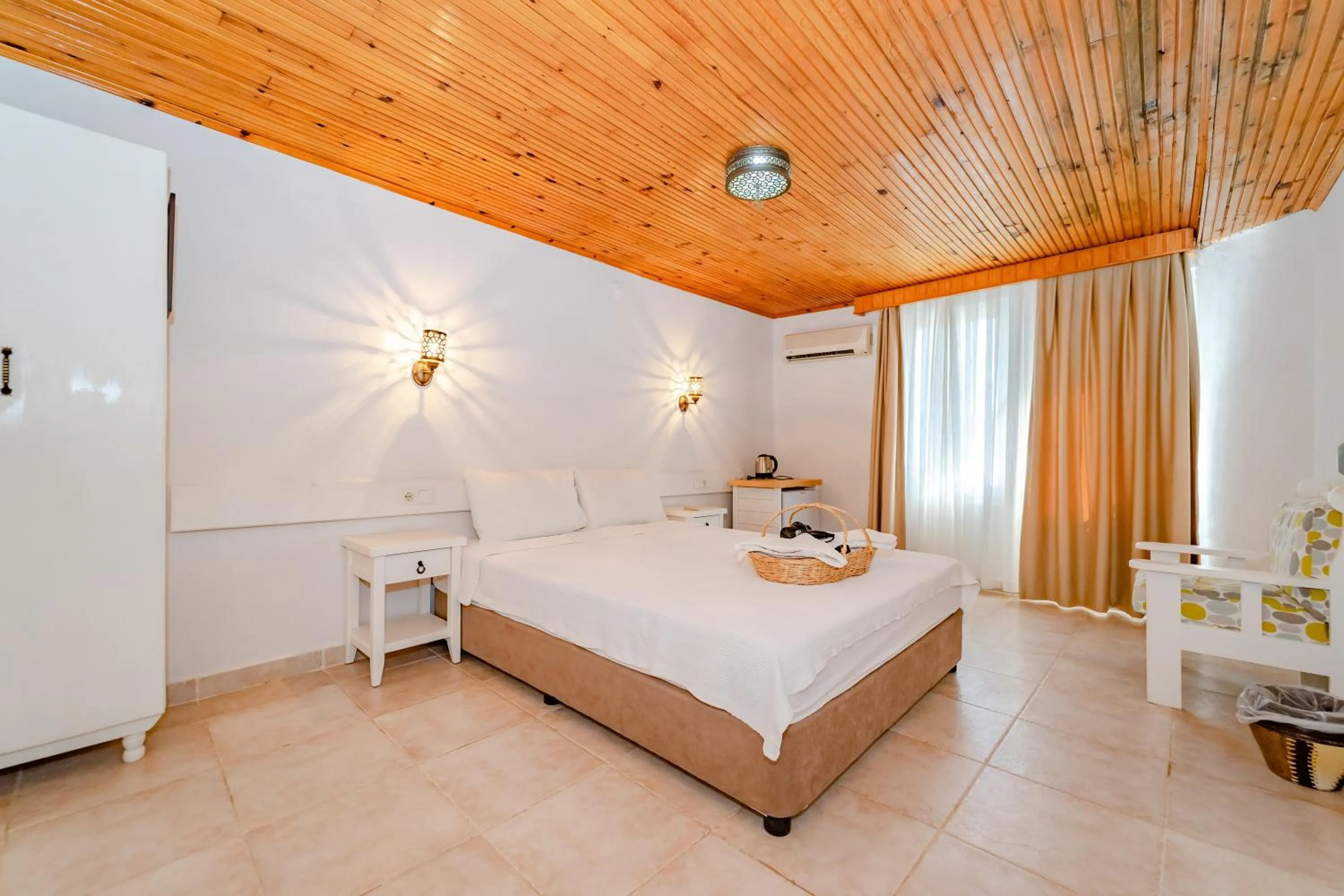 Bed in Golden Lighthouse Hotel