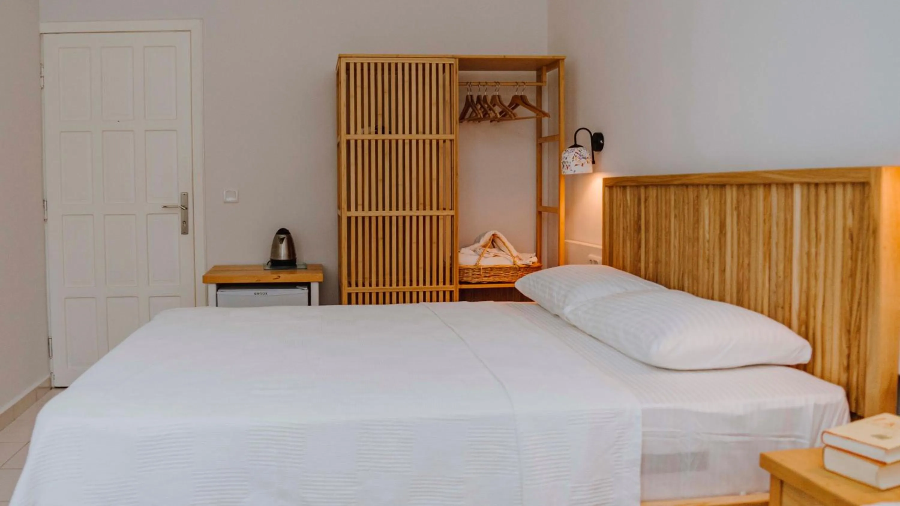 Bed in Golden Lighthouse Hotel