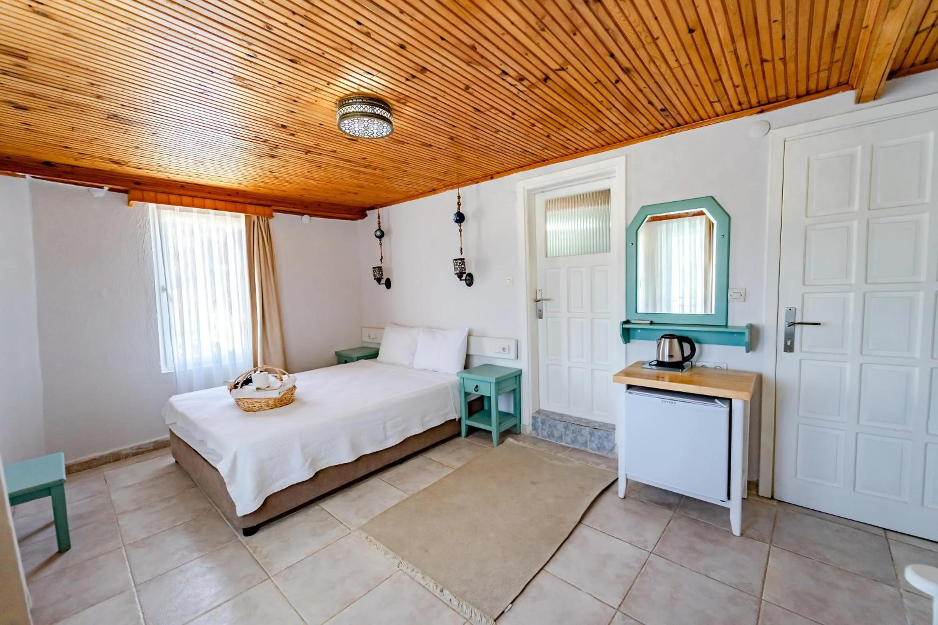 Bed in Golden Lighthouse Hotel