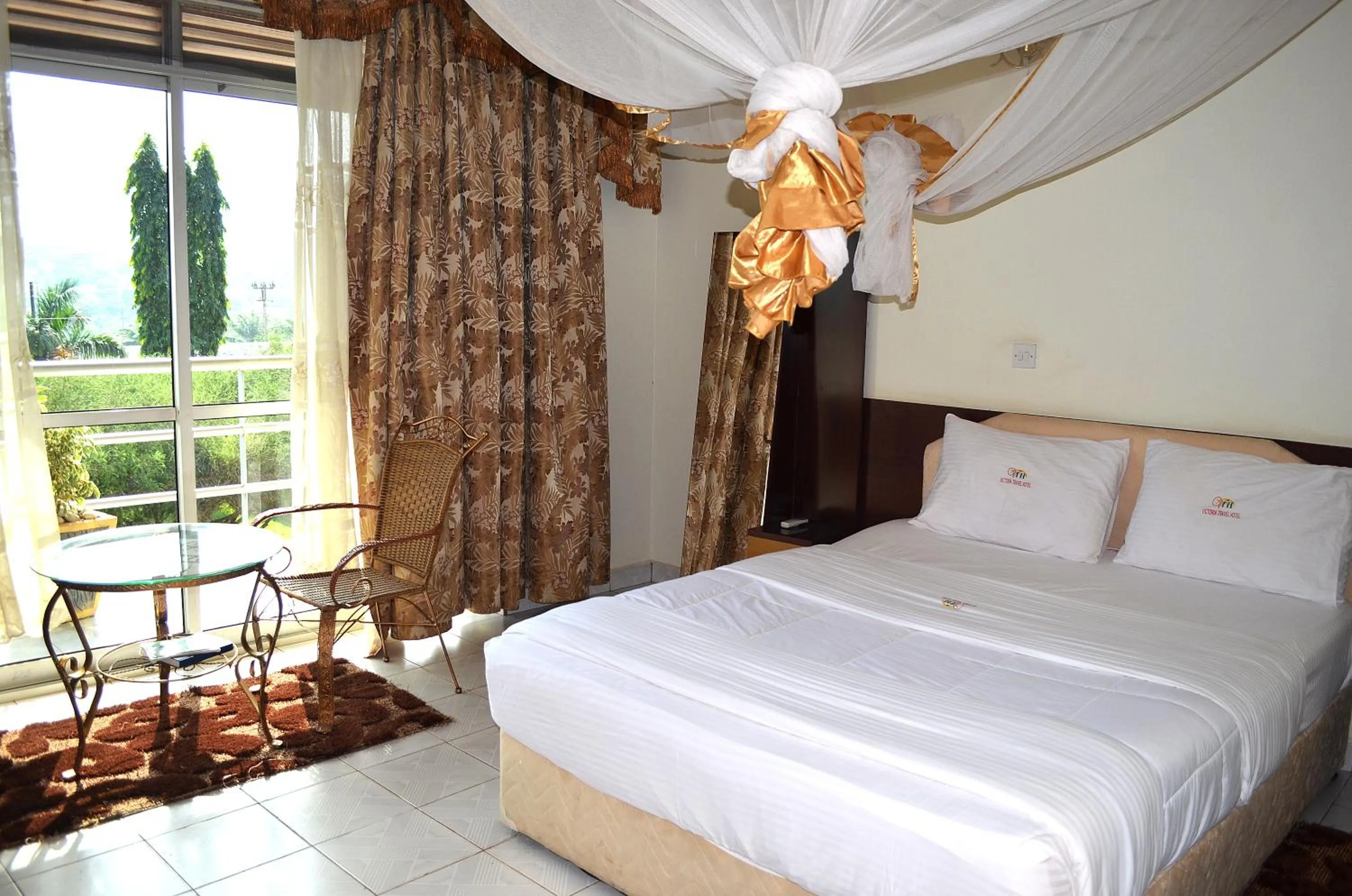 Bed in Victoria Travel Hotel